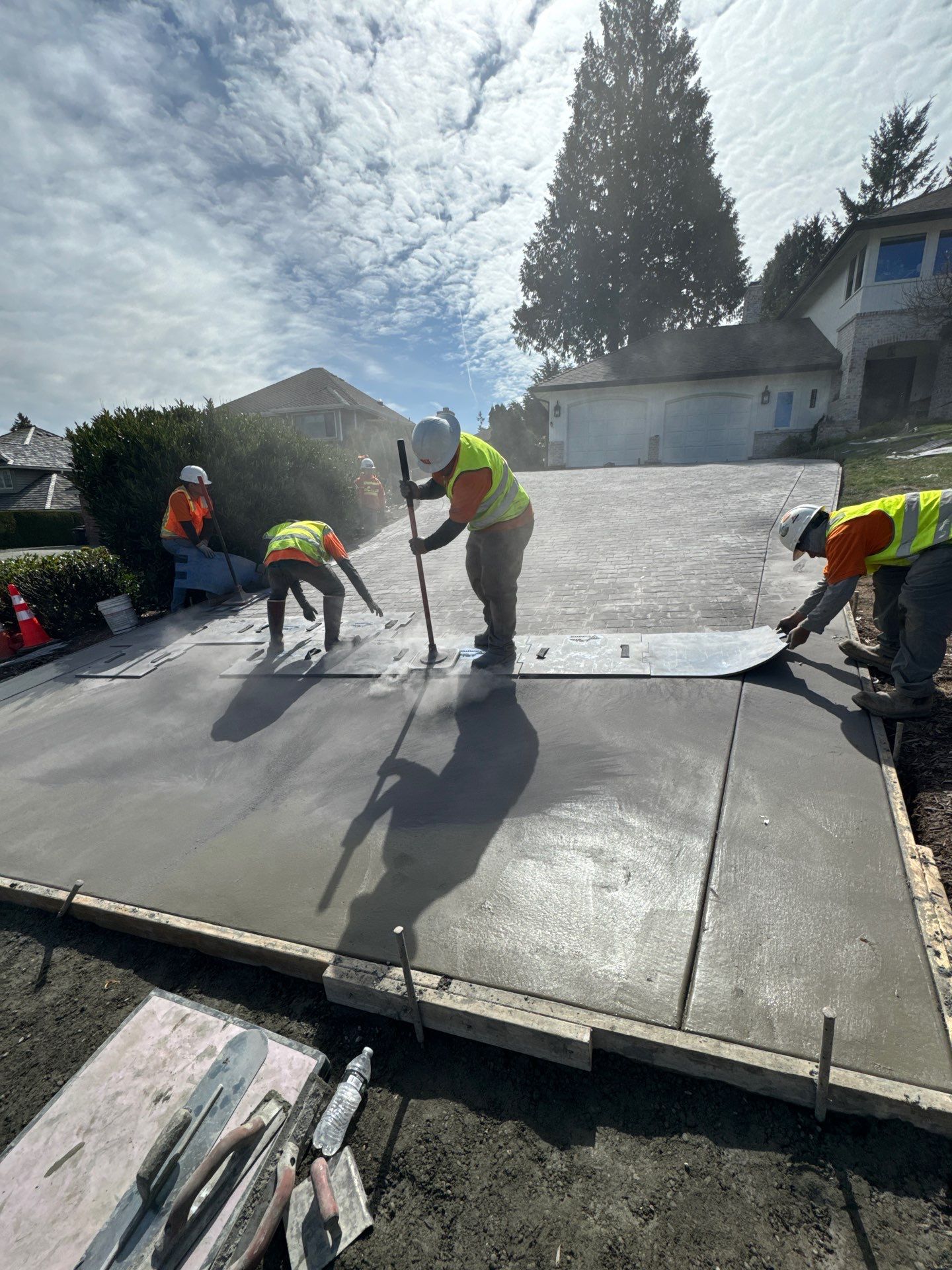 John | Stamped Concrete Driveway Makeover by Jireh Asphalt & Concrete Inc 
