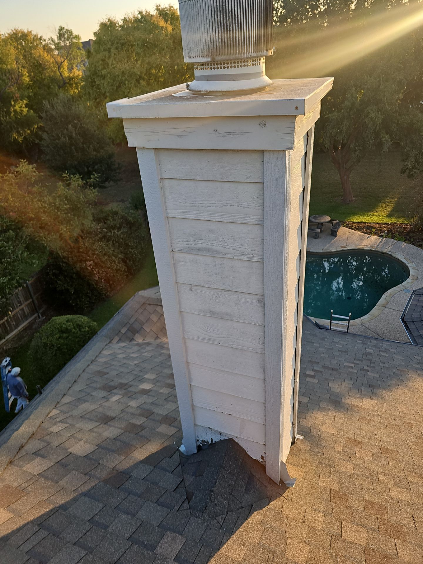 chimney repair using lap engineered treated composite siding. by road roofing llc