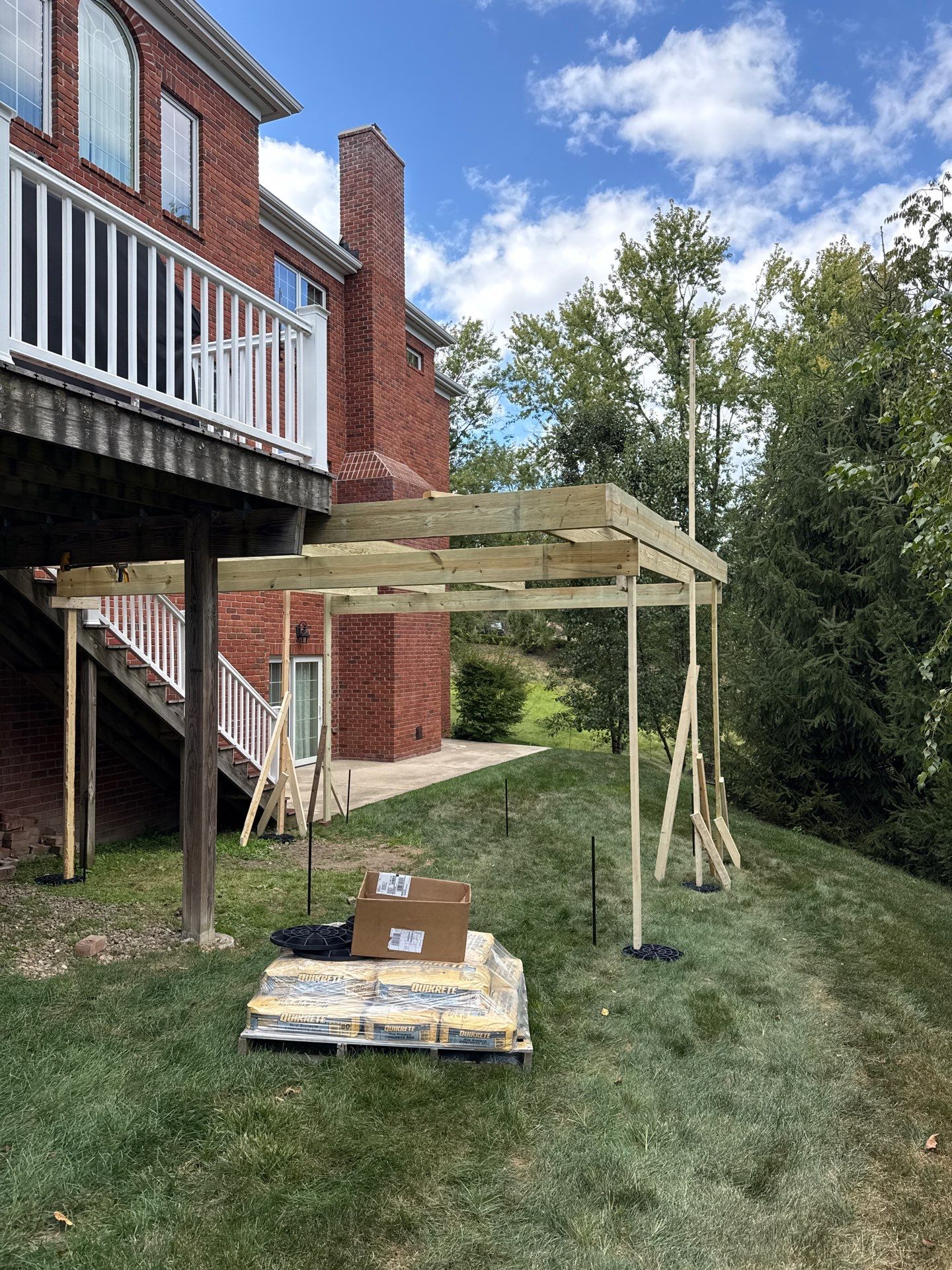 Deck extension  by Cousins Roofing Siding & Decks