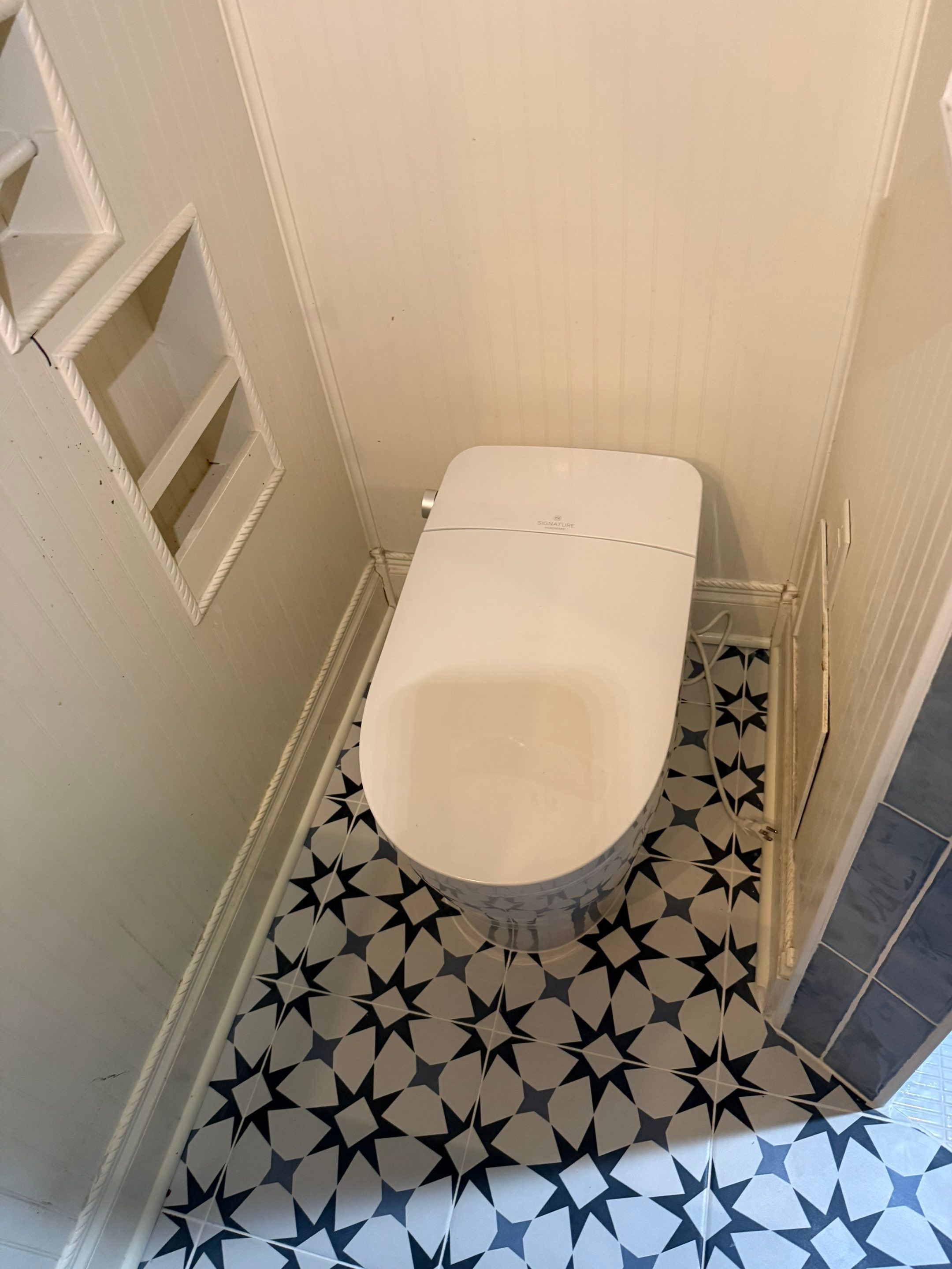 Tile shower and floor by Footprints Floors of Nashville