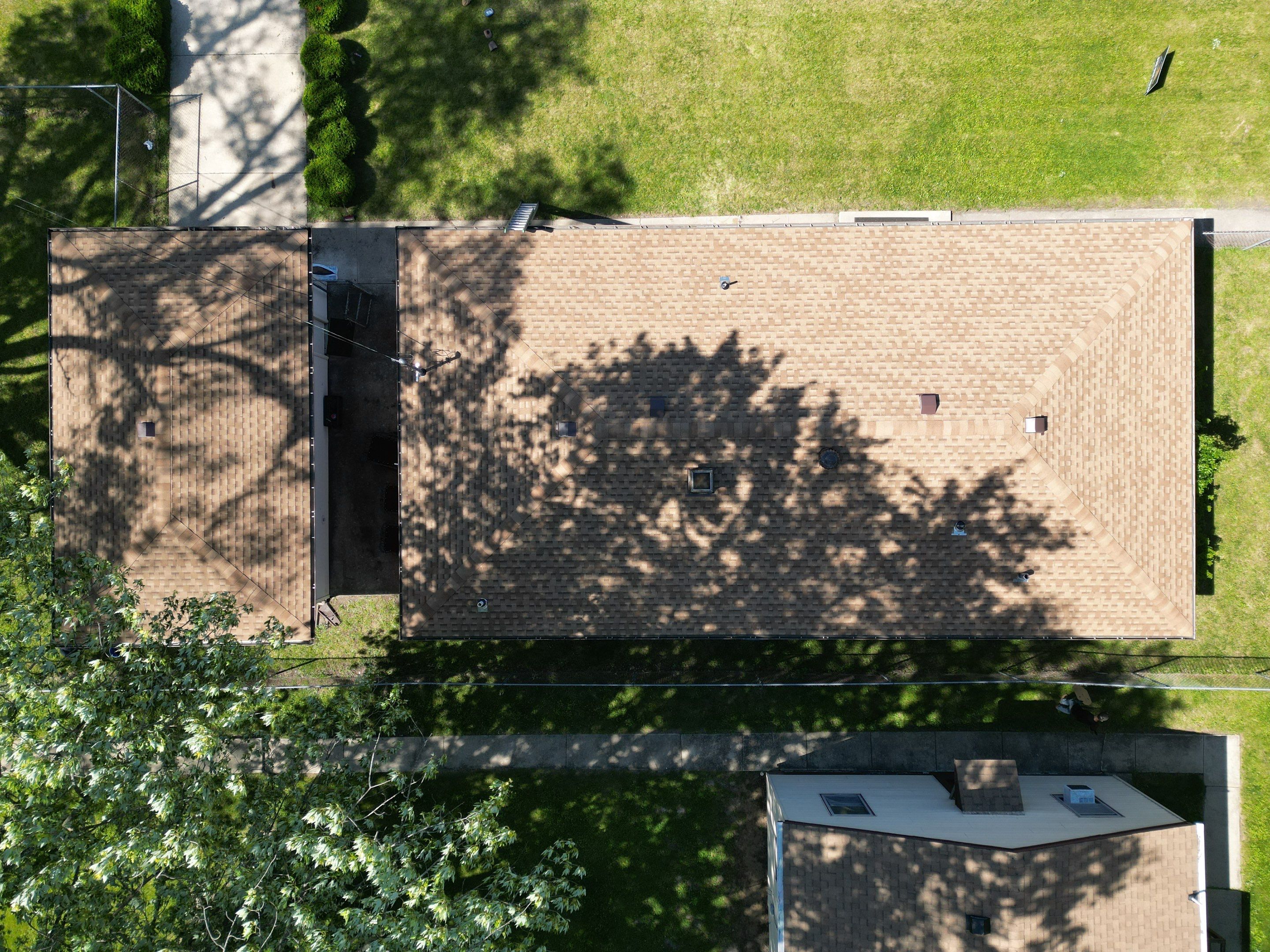 Roof replacement by Optimal Home Improvement 