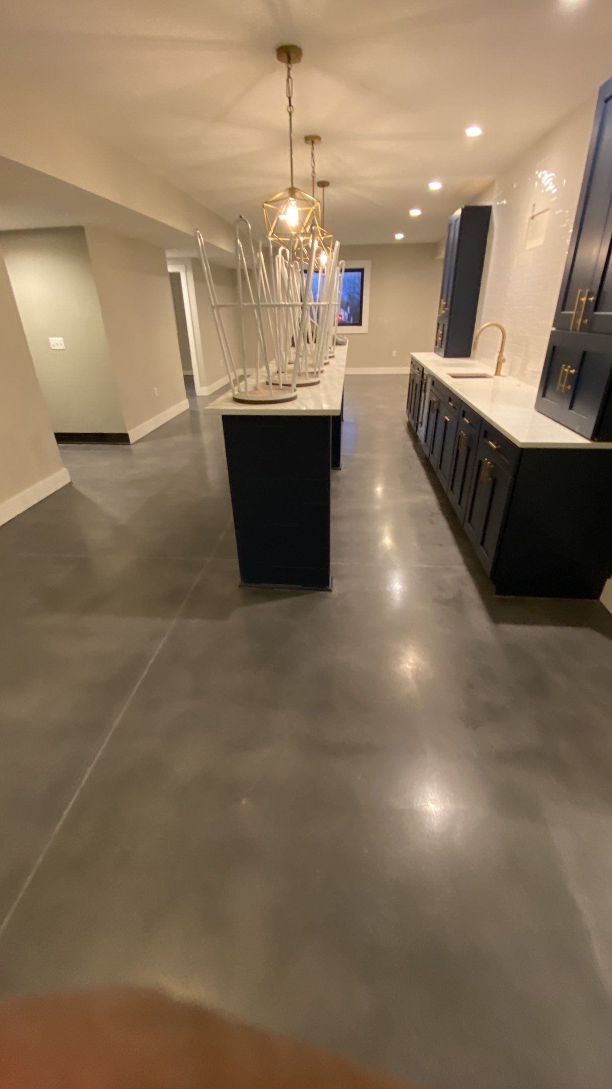 Louisburg, KS -- Basement Polish using Grey Stain by Big Red Decorative Concrete, LLC