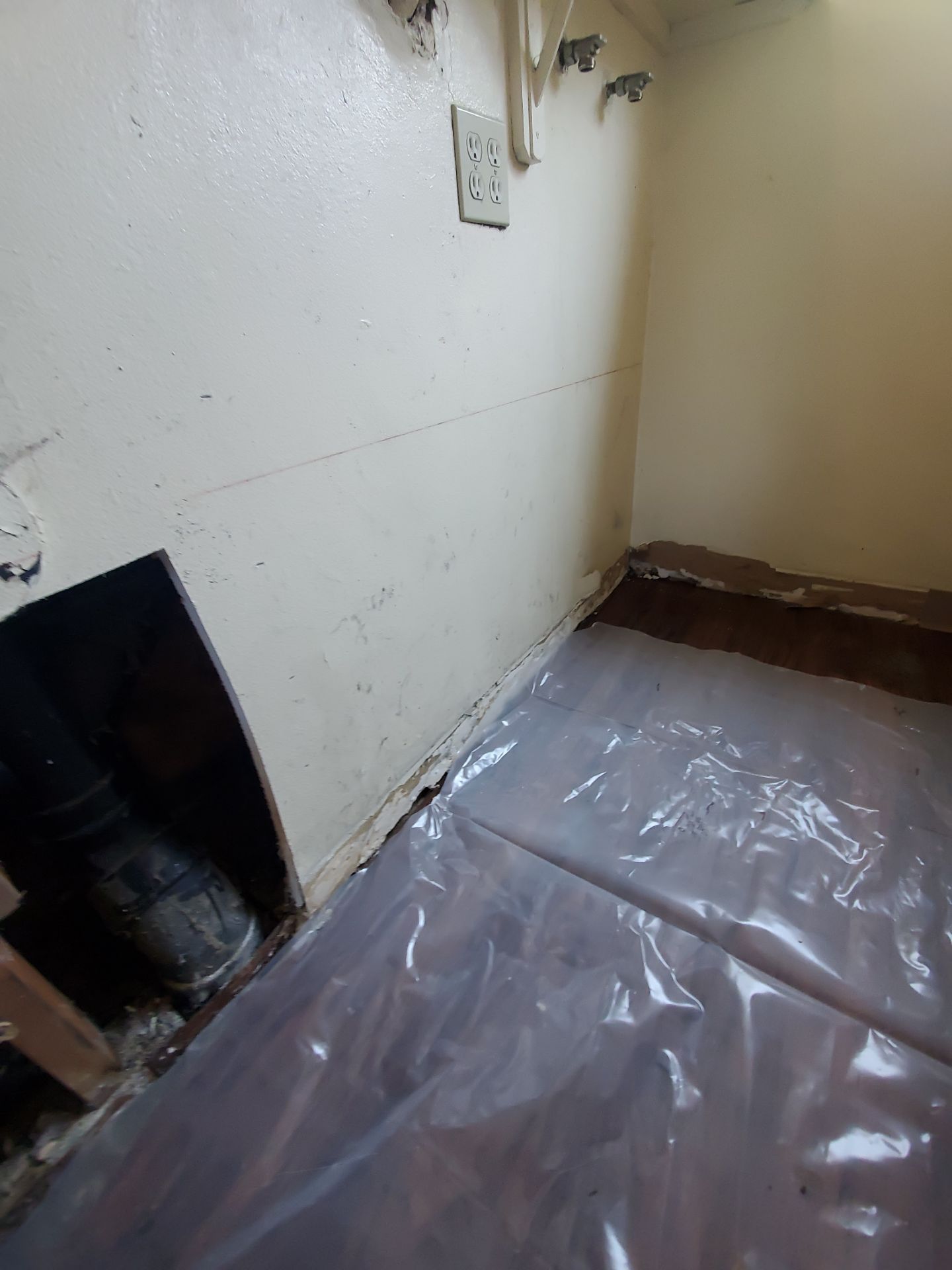 Laundry Room Water Restoration & Rebuild in Irvine by One Stop Source
