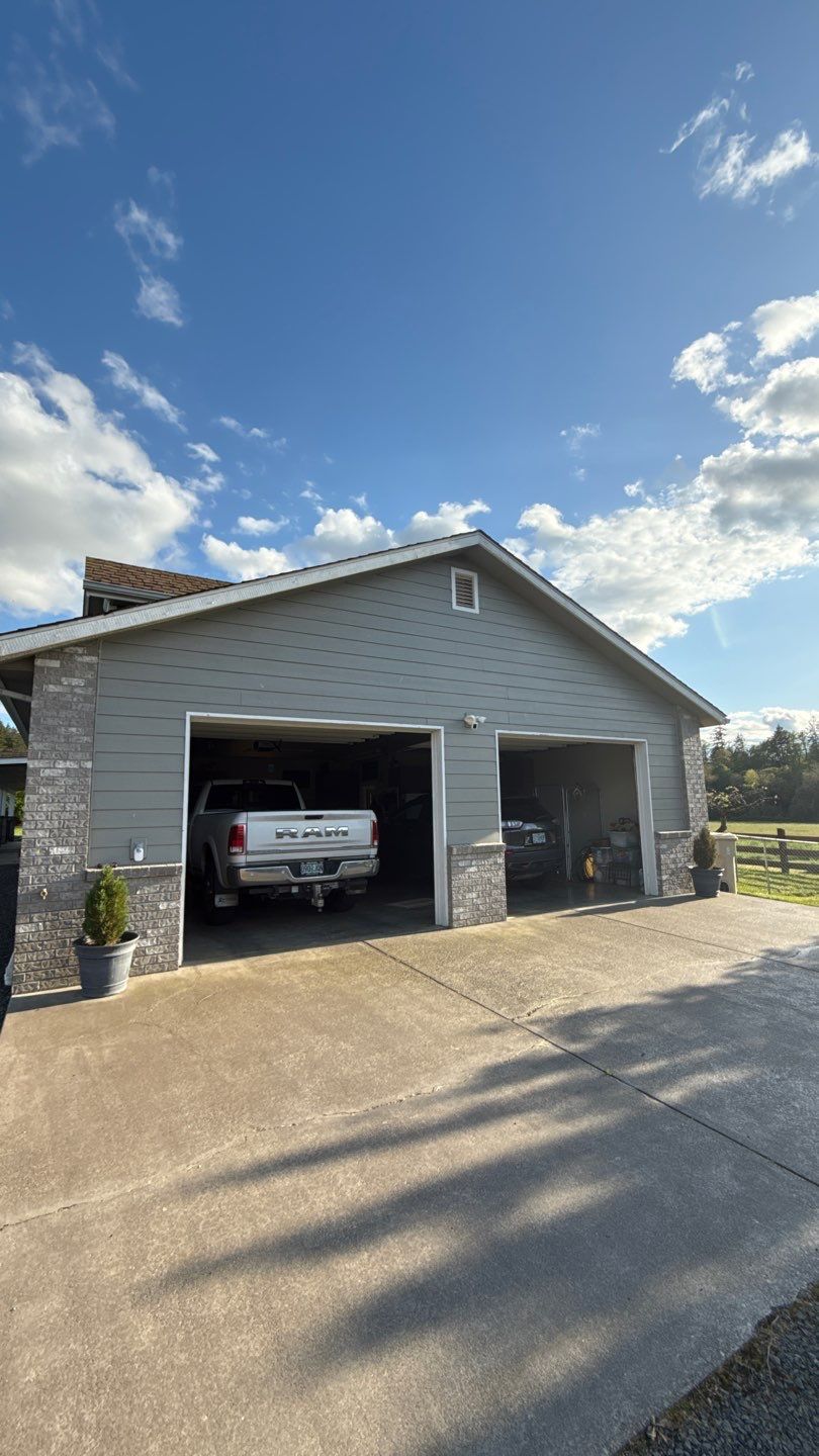 Glacier Roof Replacement with Metal Accents by Orezona Building & Roofing Company, Inc.