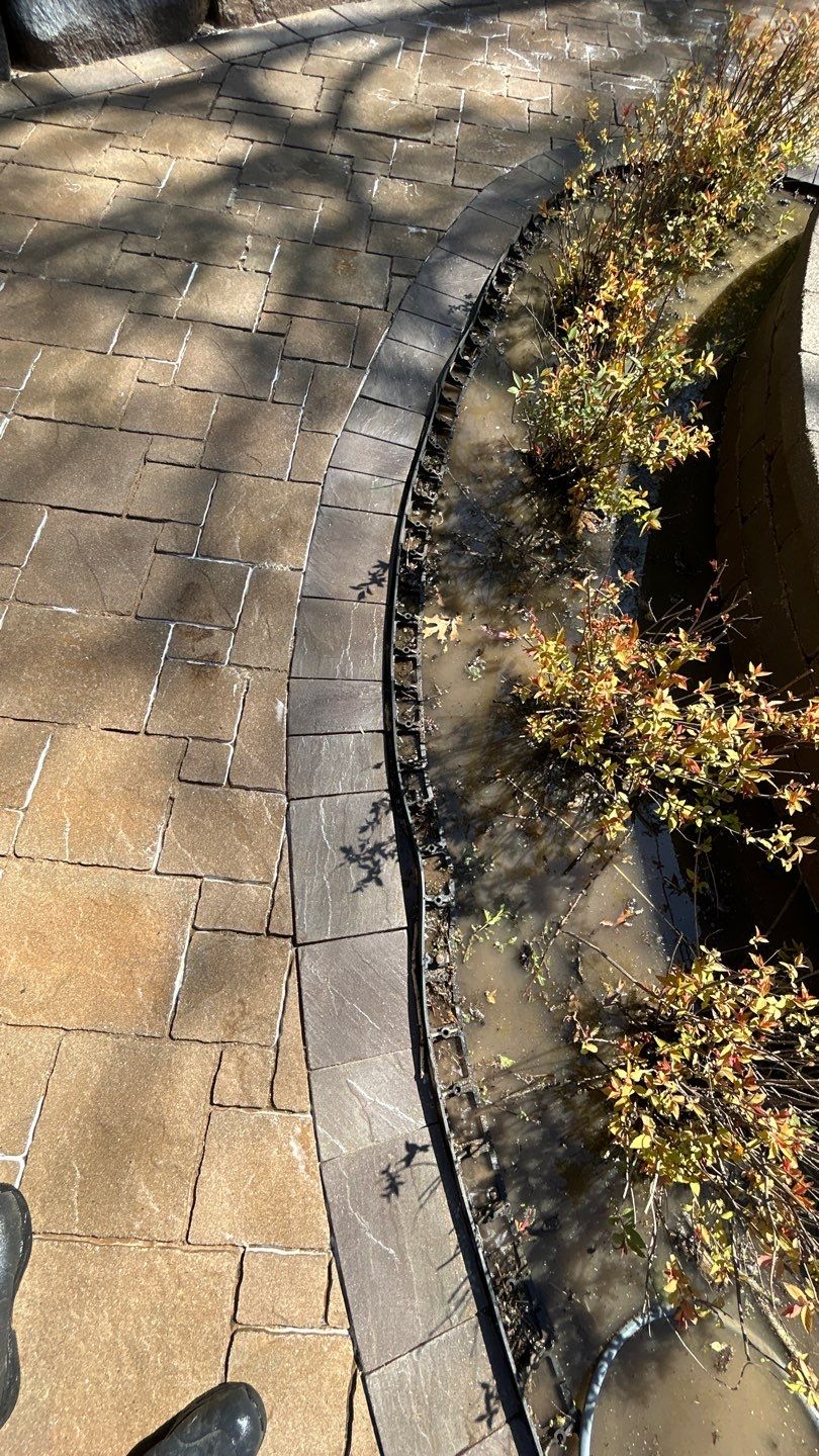natural stone using Algaecide, soft wash soap by Northern Power Washing LLC.