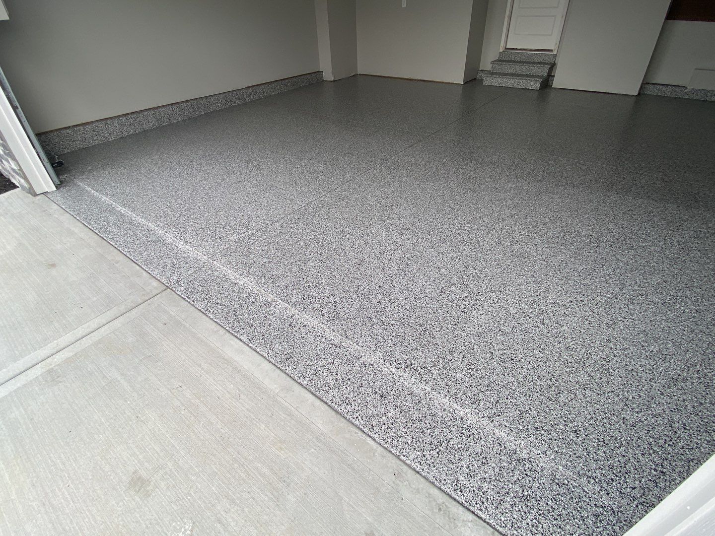 Garage using Domino  by Select Painting, Coatings & Garage Cabinets