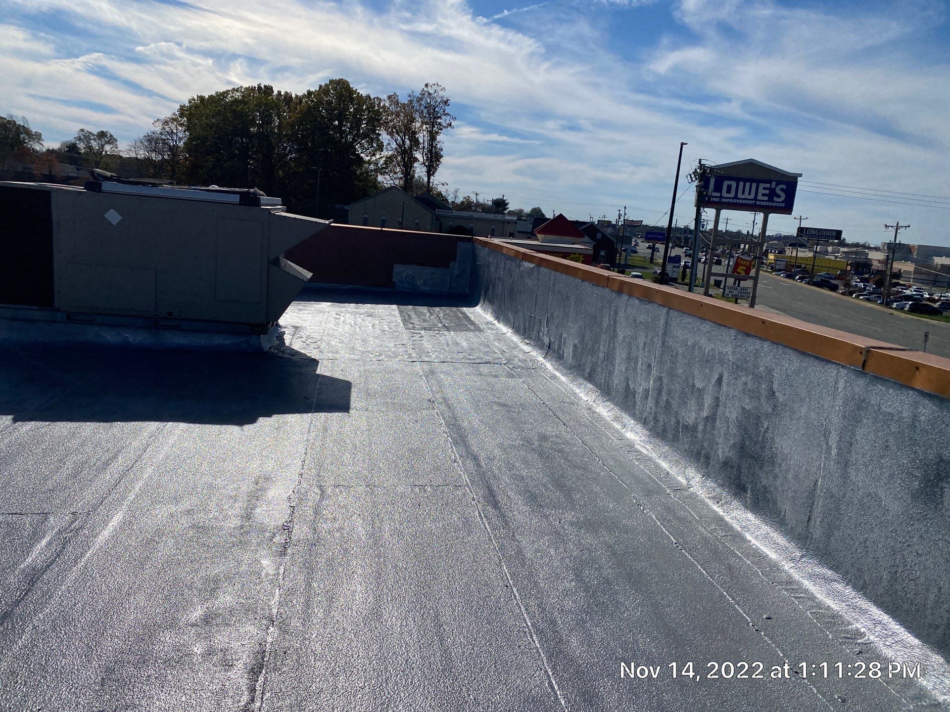 Commercial Coating using Poly Urerthane and Silicone Coating by Just In Time Roofing and Restoration