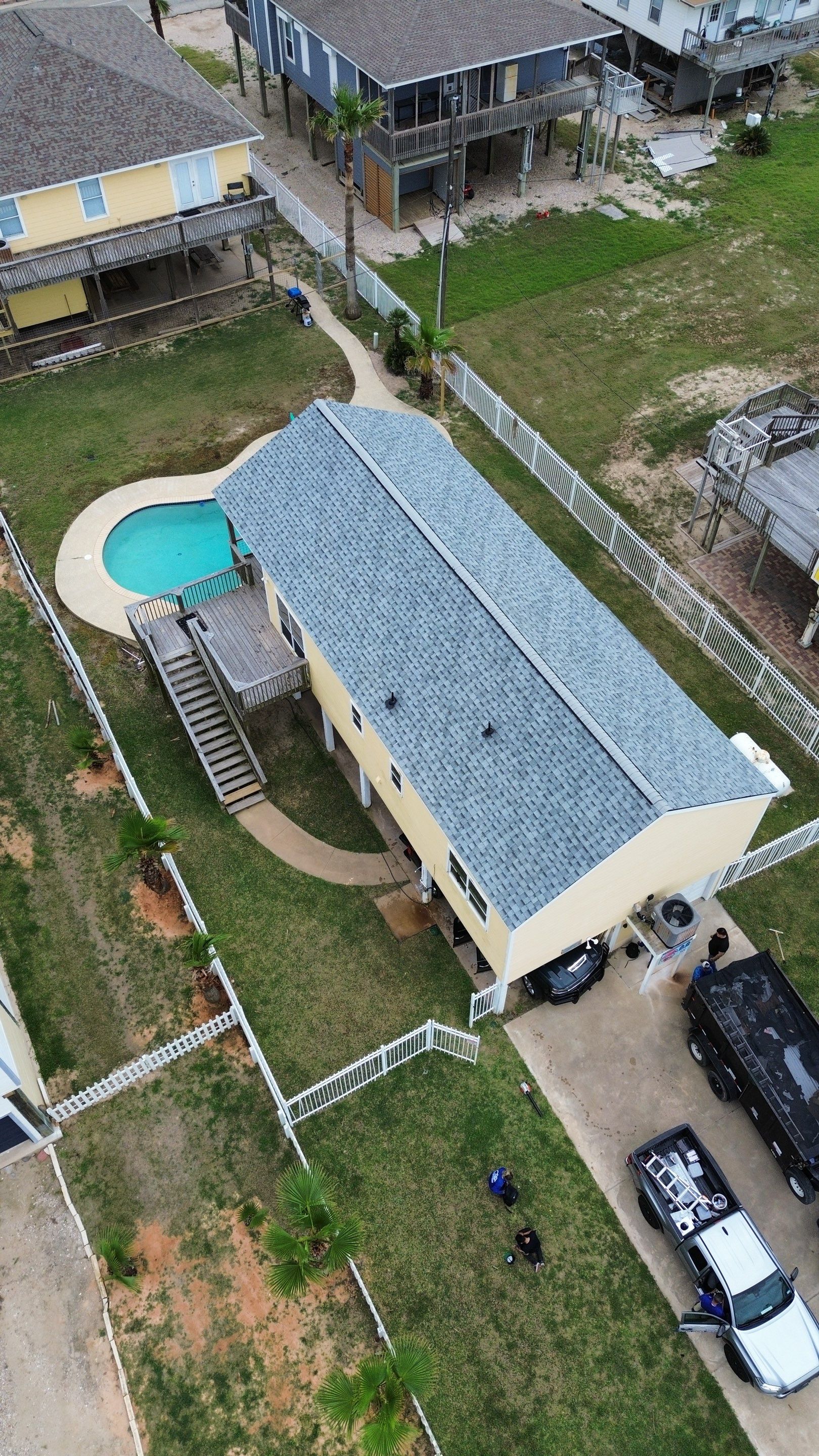 Roof Replacement using IKO Cambridge Dual Grey by CAP Roofing and Construction LLC