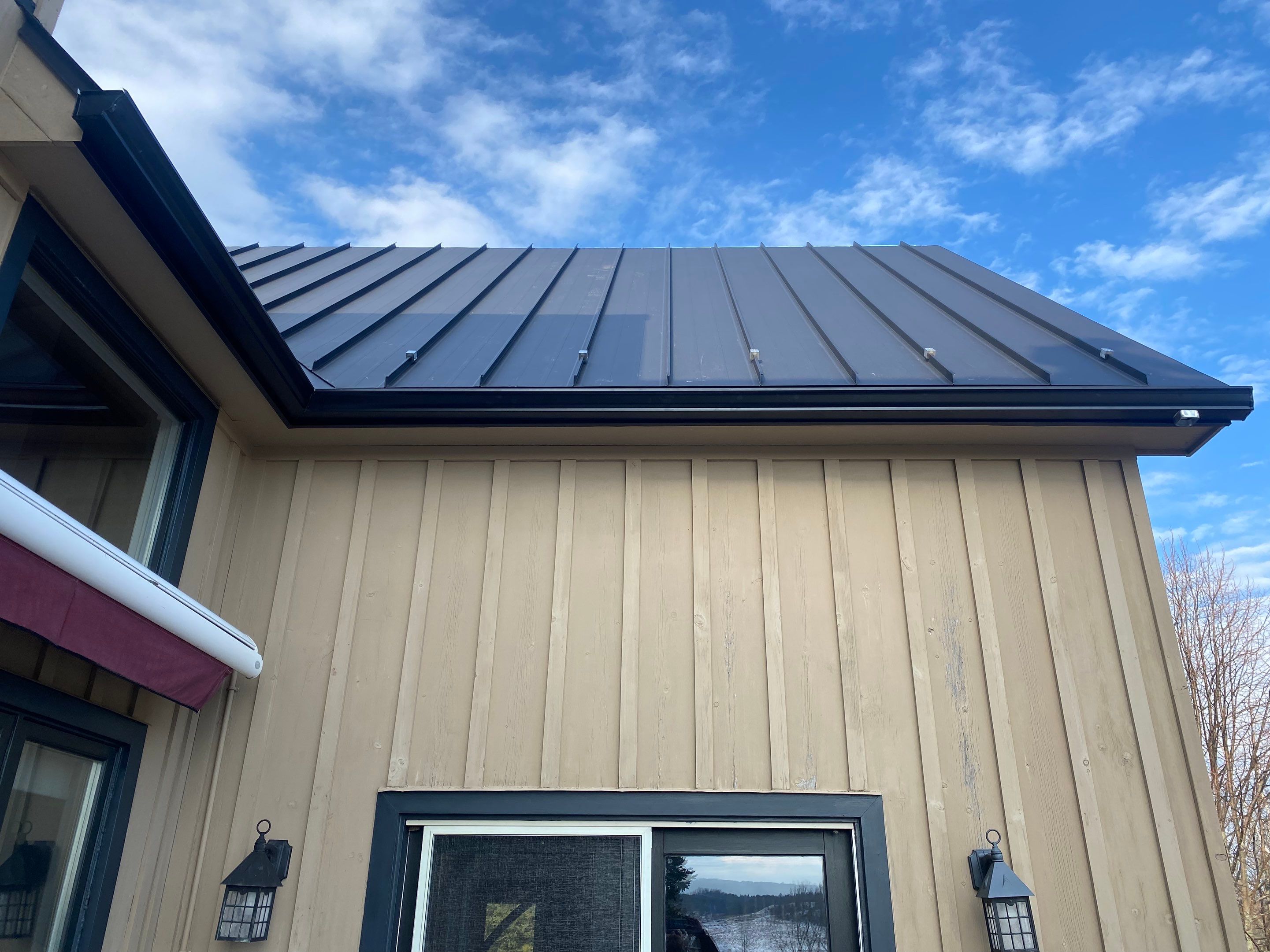 Residential Roofing Installation using 24 Ga Standing Seam Metal by Jay Carter Roofing & Sheet Metal