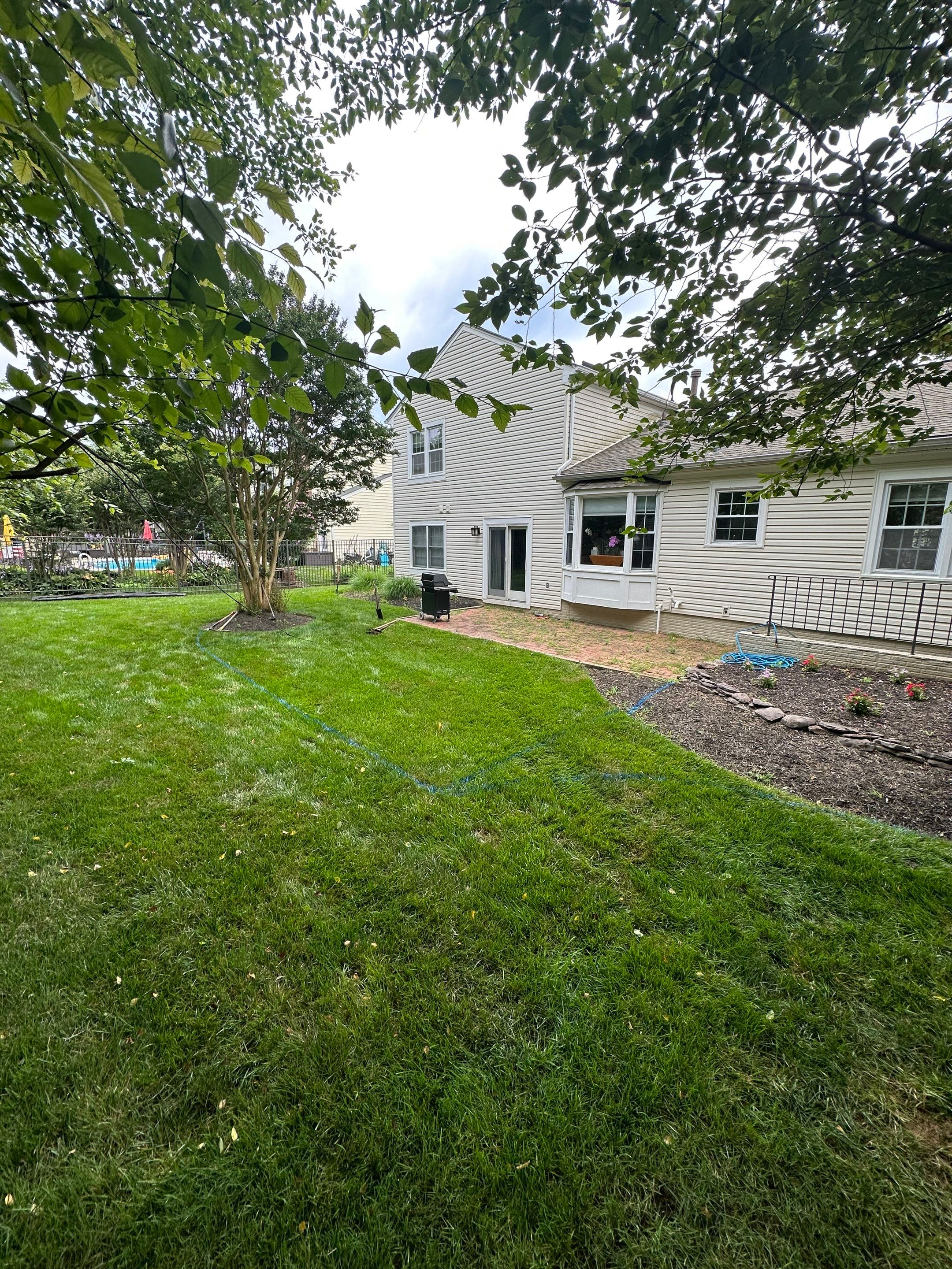 Backyard Transformation using Techo-Bloc Pavers by The Smet Companies, LLC