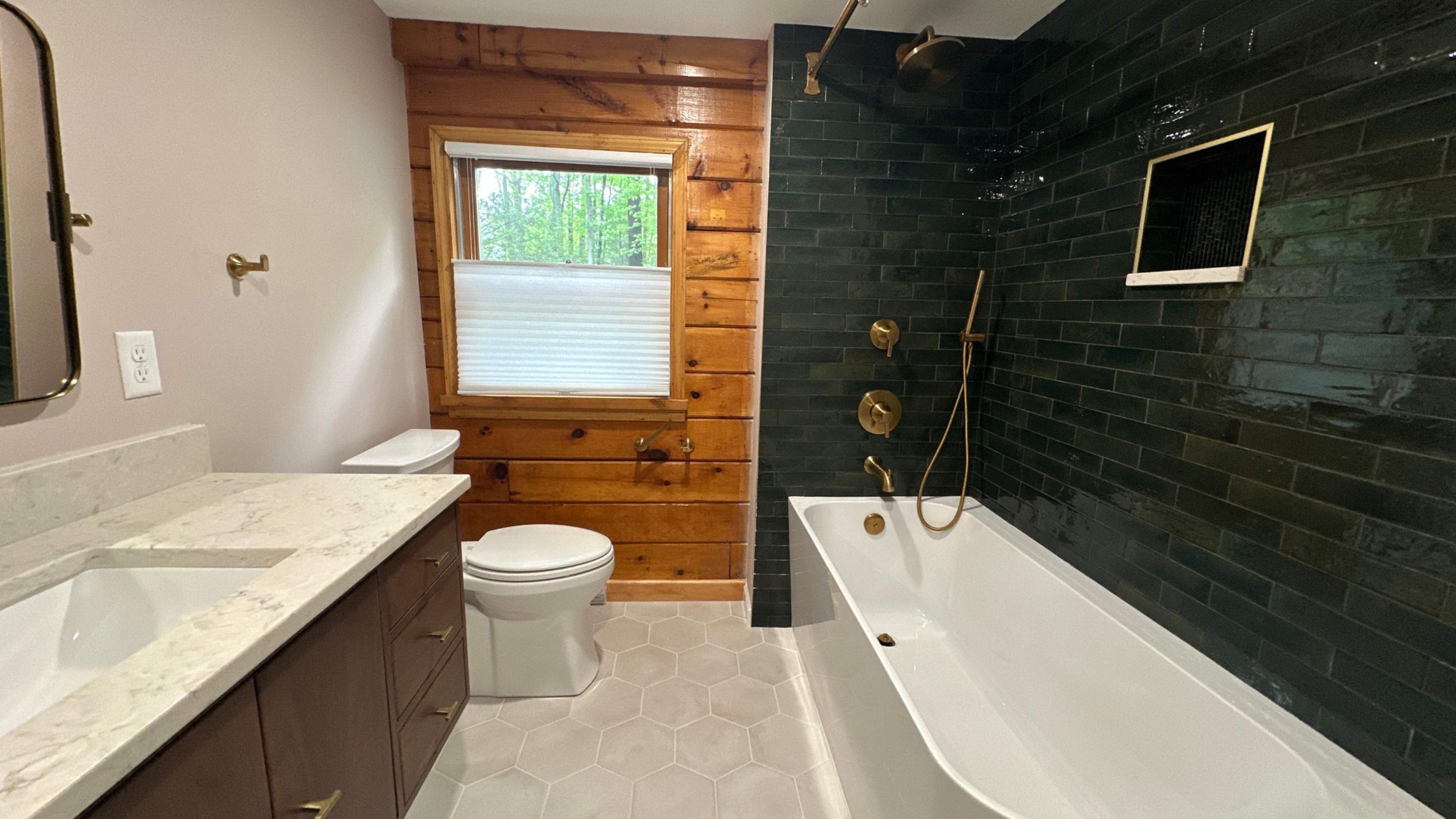 Brandt Double Bathroom Remodels by Integrity Tile and Home LLC