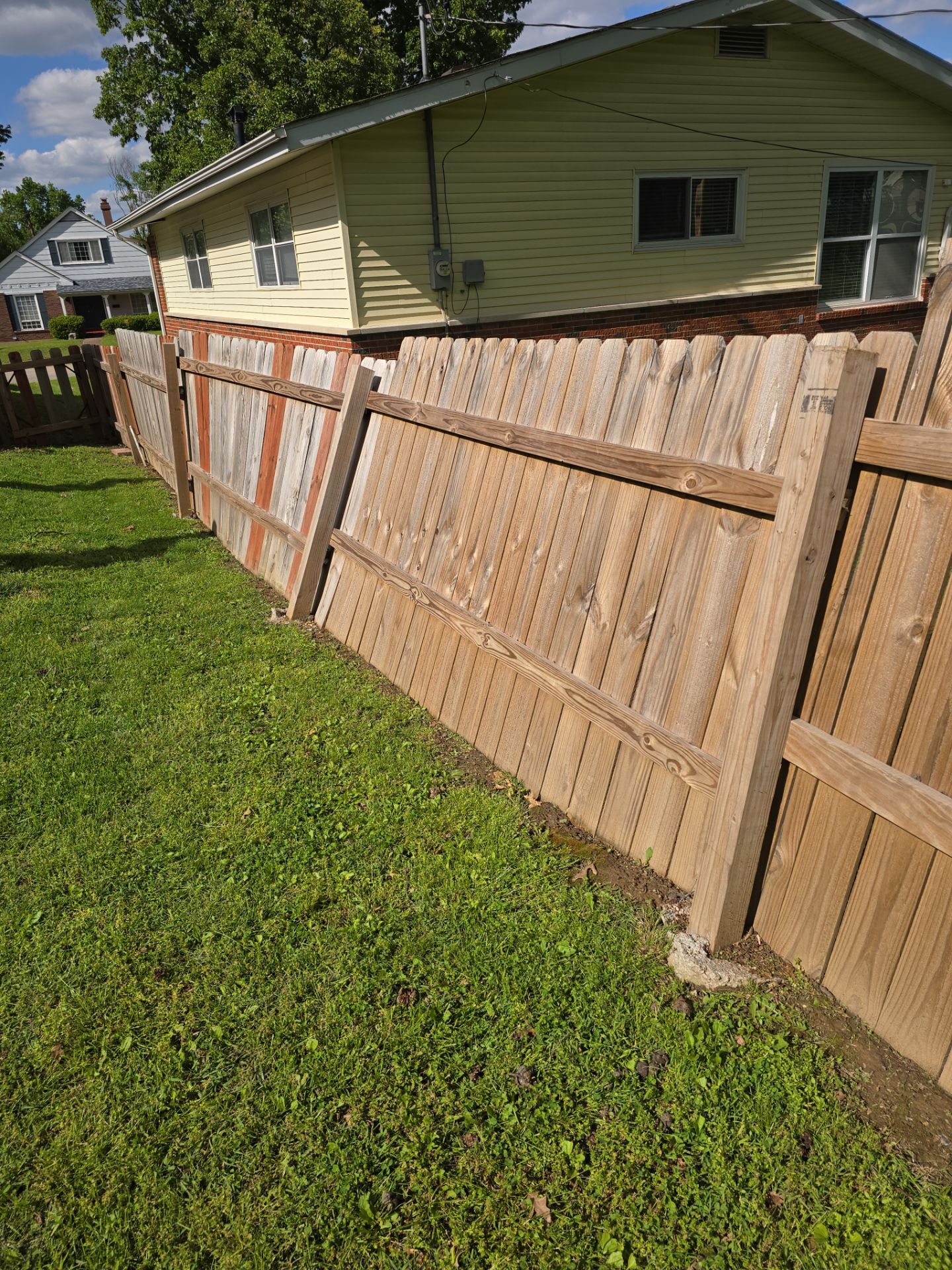 Wood Fence Post Replacement & Stabilization – Florissant, MO by Legendary Services Company LLC.