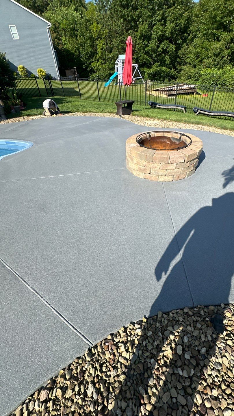 Twilight Pool Deck / Patio Project in Beaver falls by Floors in a Day, Inc