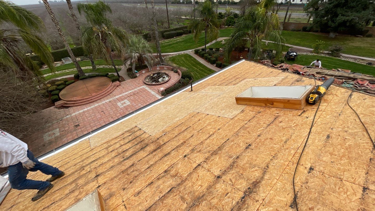 Tile refurbish project using existing tiles and replaced underlayment and battens by Straight Edge Roofing Inc