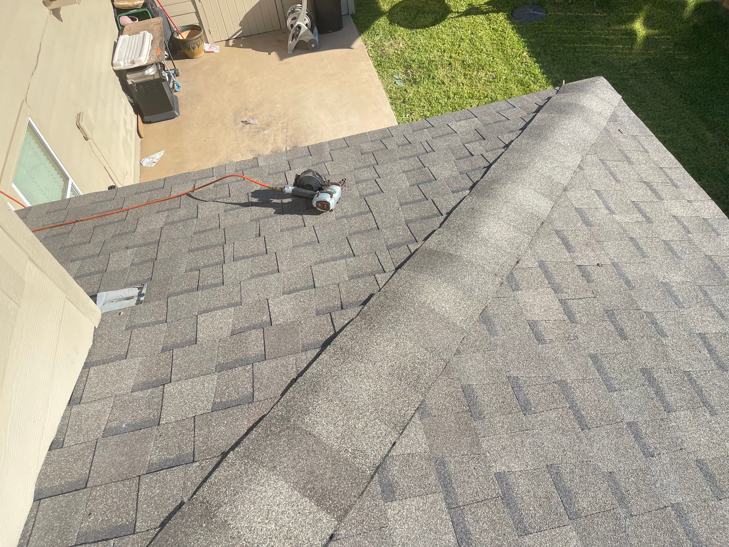 Residential Roofing Installation using Atlas Pinnacle® Pristine Shingles Weatherwood Color by CAP Roofing and Construction LLC