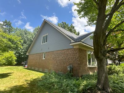 Siding Replacement using CertainTeed Monogram D5 Clapboard
