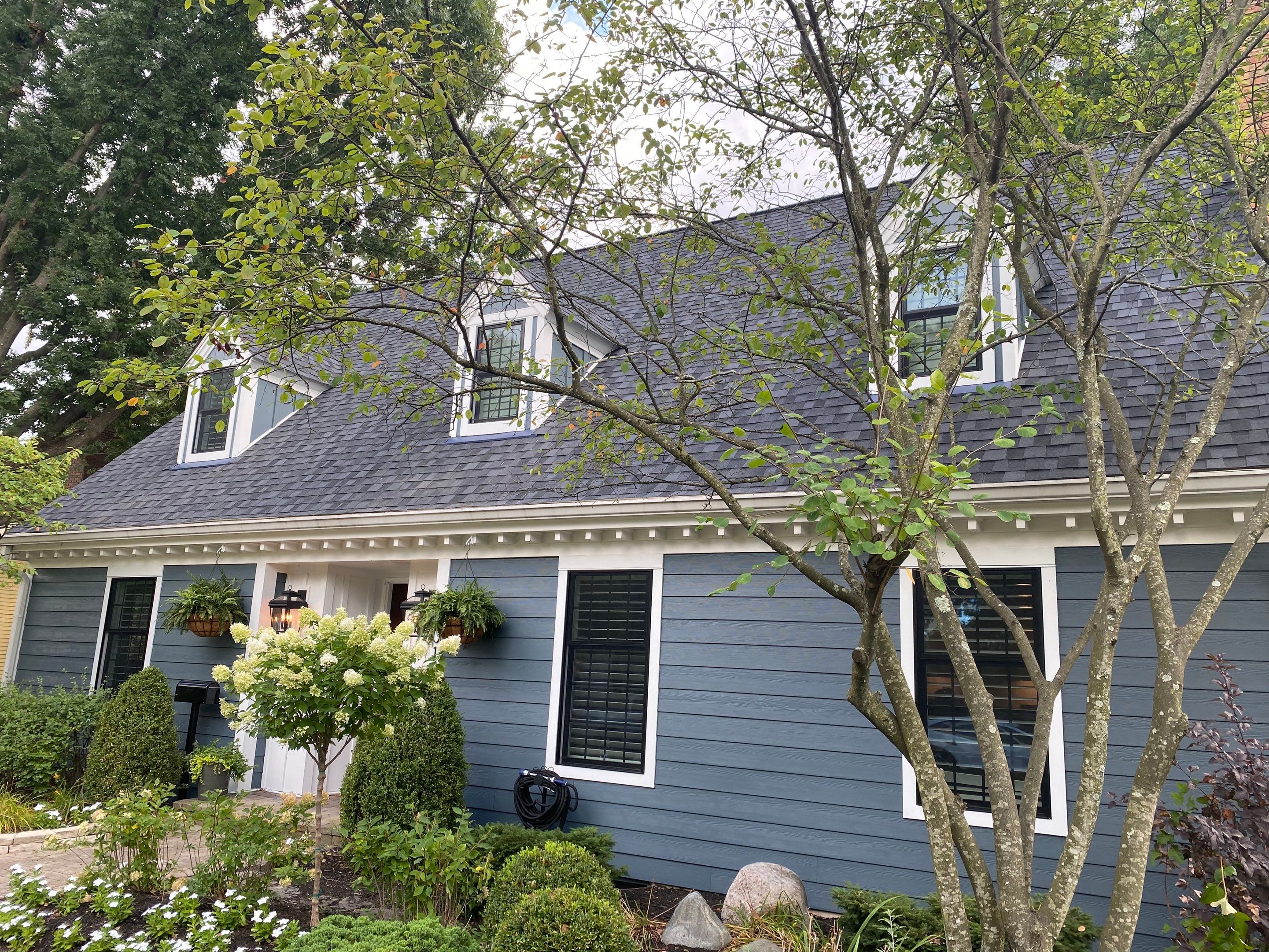 Residential Roofing Installation using James Hardie Fiber Cement Lap Siding and Certainteed Landmark Pro Shingles by Best Exteriors Inc