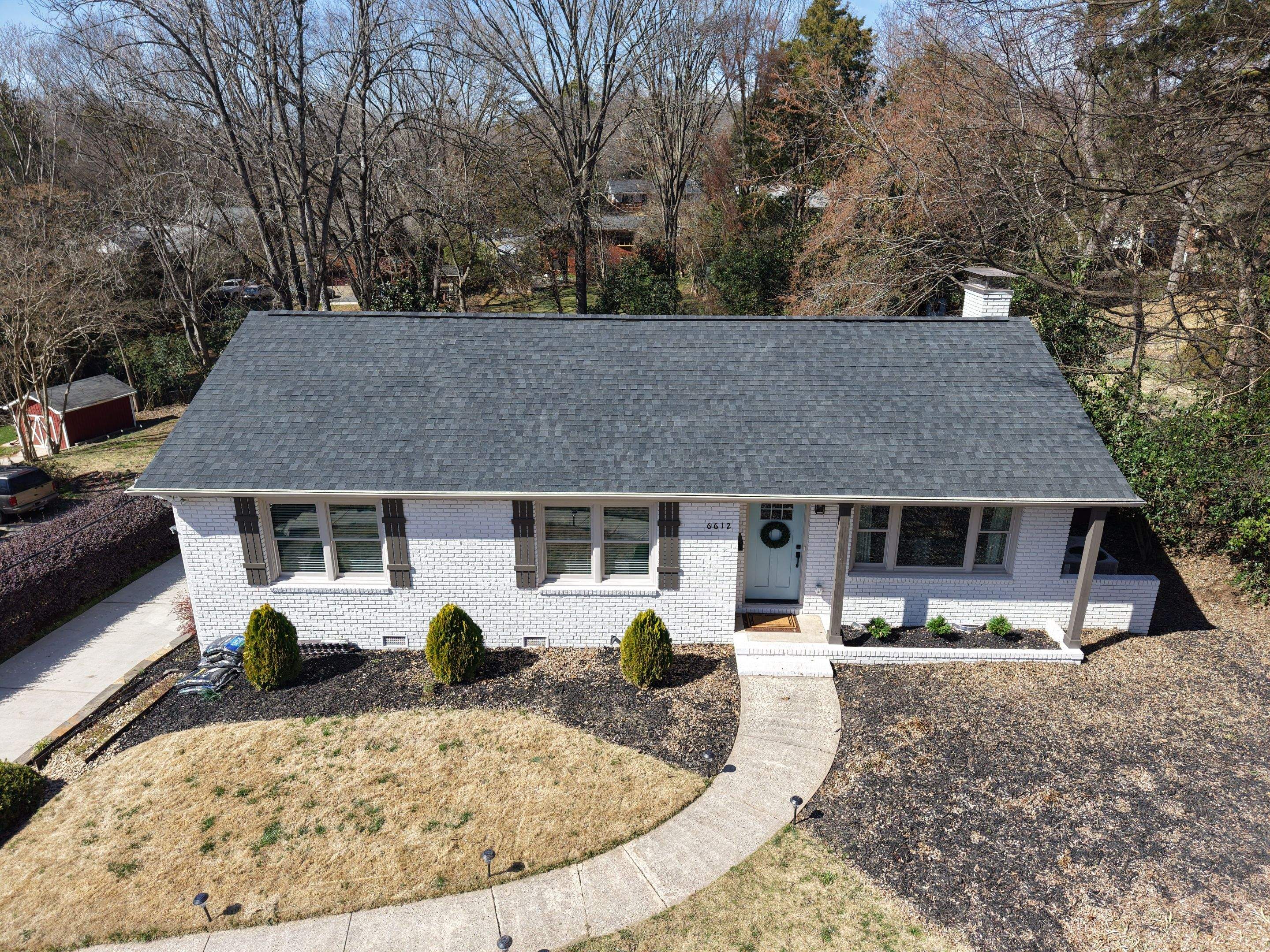 Residential Roofing Installation using TAMKO TITAN XT Rustic Black by RISE Roofing & Restoration, LLC