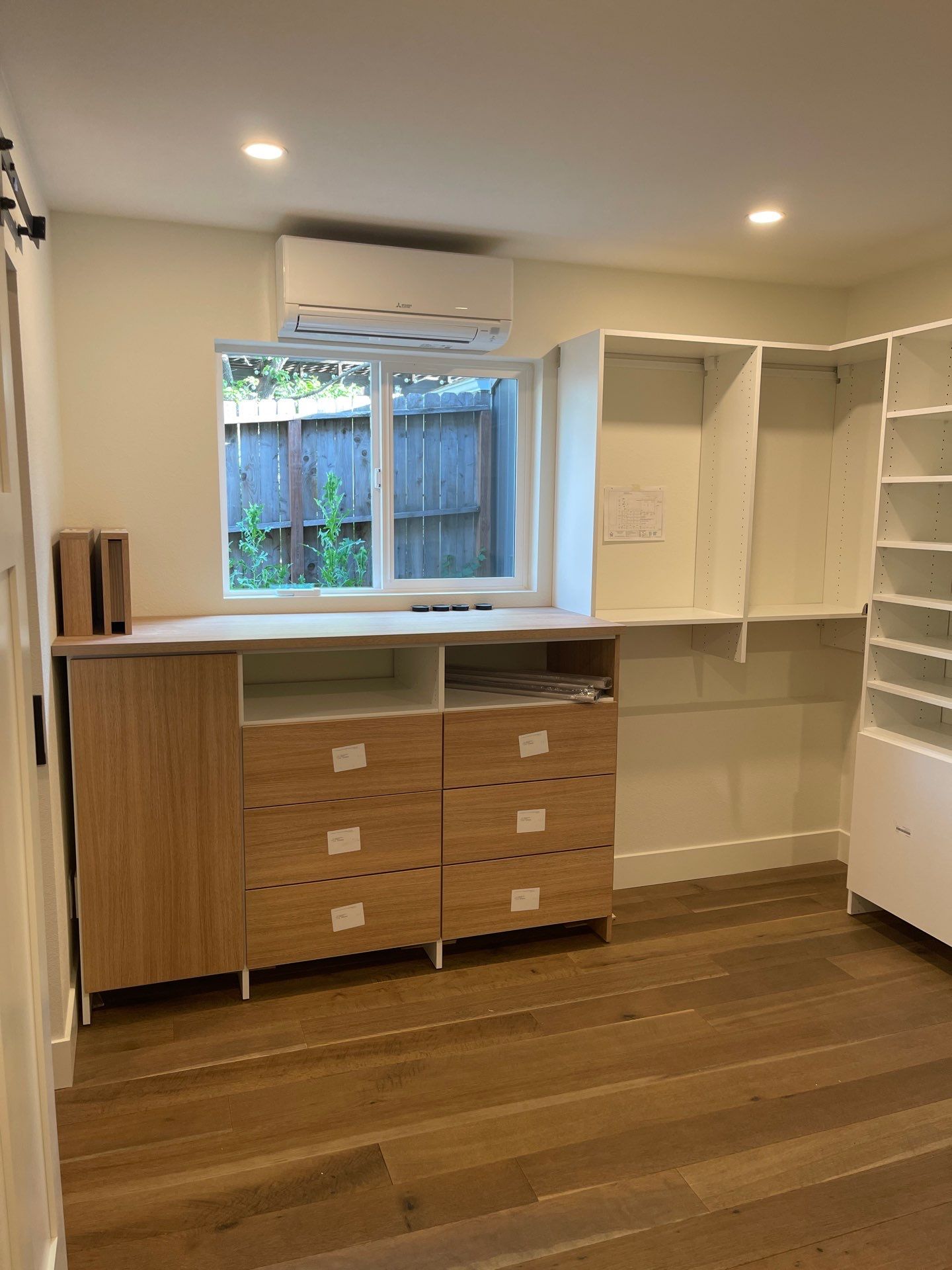 Two-Tone Walk-In Closet in Boulder by Concept 32, Inc.