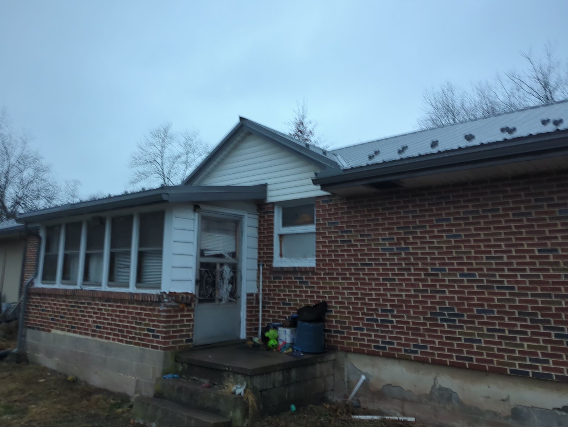Metal Roofing Replacement and Sunroom Addition in Halifax by Esh Builders