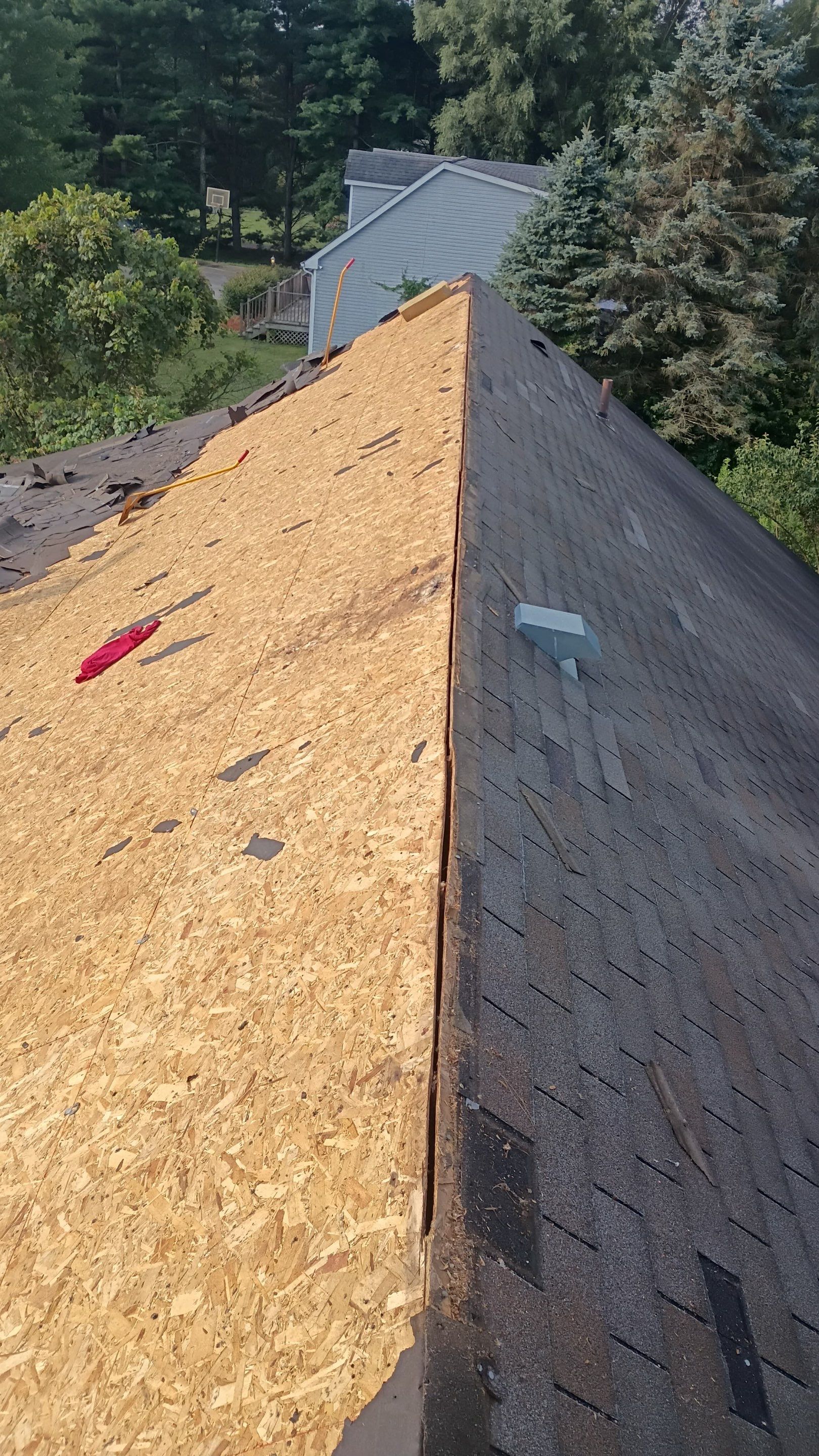 Residential Roofing Installation using GAF Timberline HDZ Charcoal by Rainstoppers Roofing