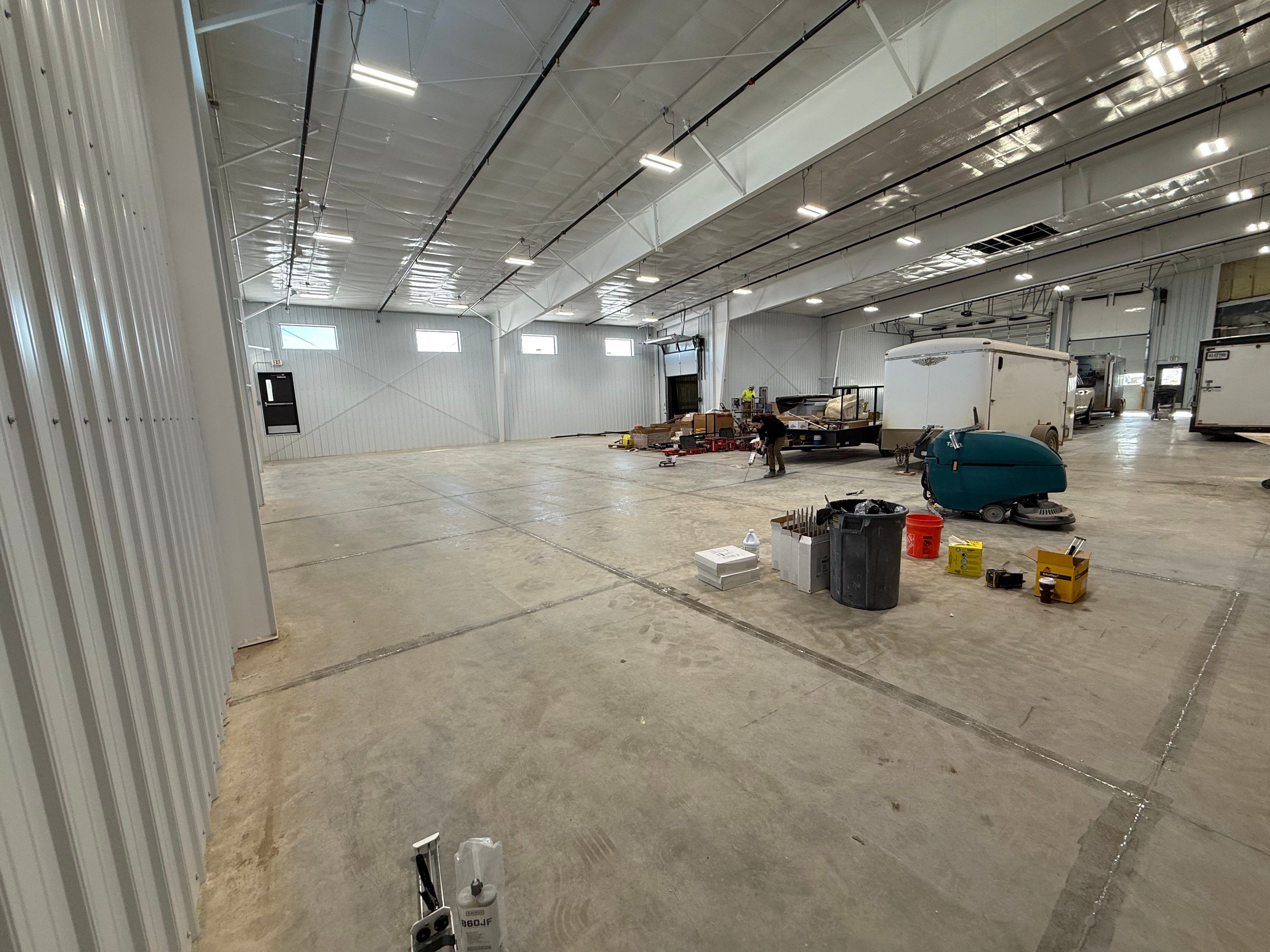 Industrial Concrete Polishing and Coating for Large Manufacturing Warehouse by Select Painting, Coatings & Garage Cabinets