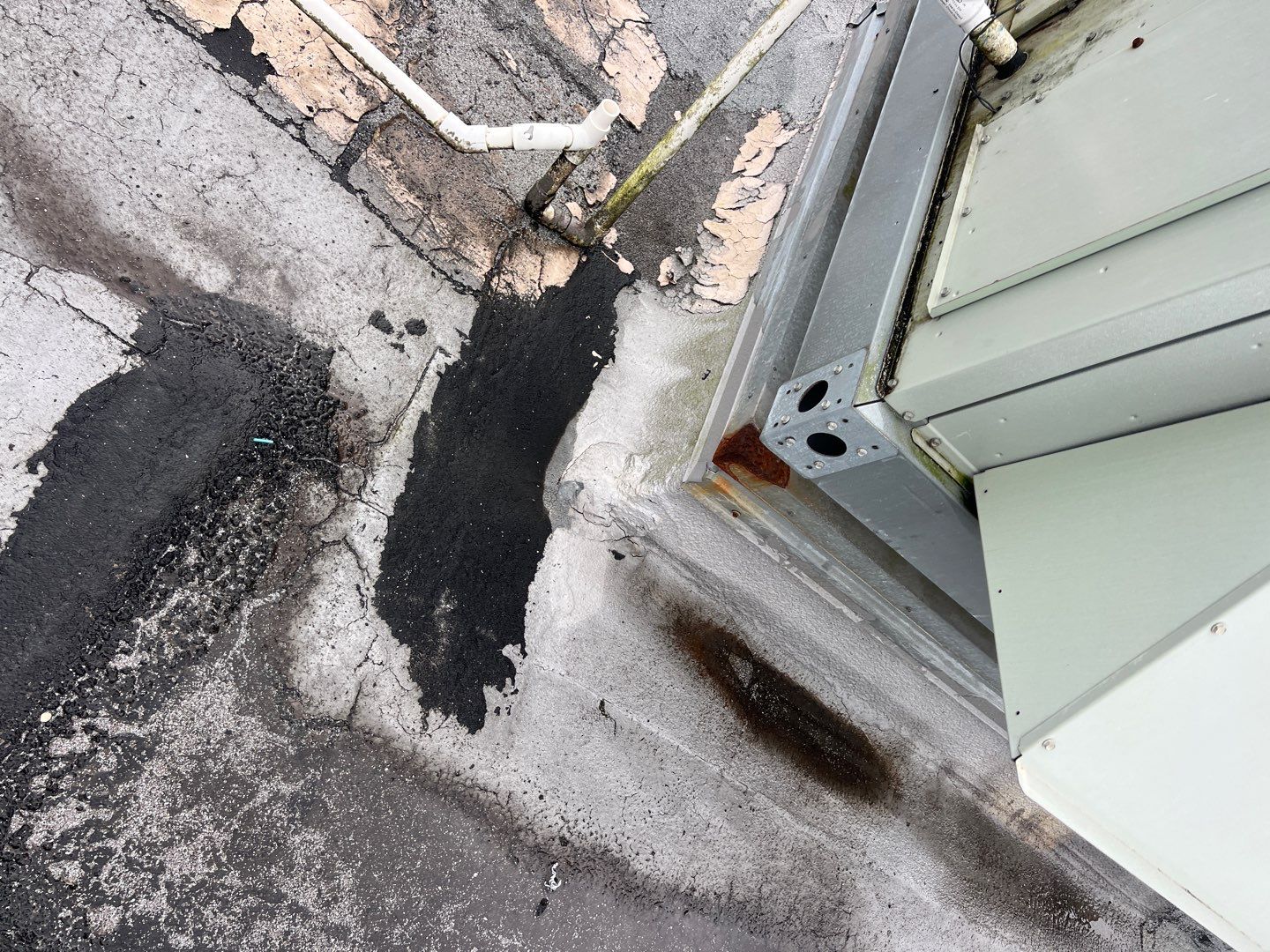 Commercial Roofing Repair using Roof Sealant by Four Peaks Roofing