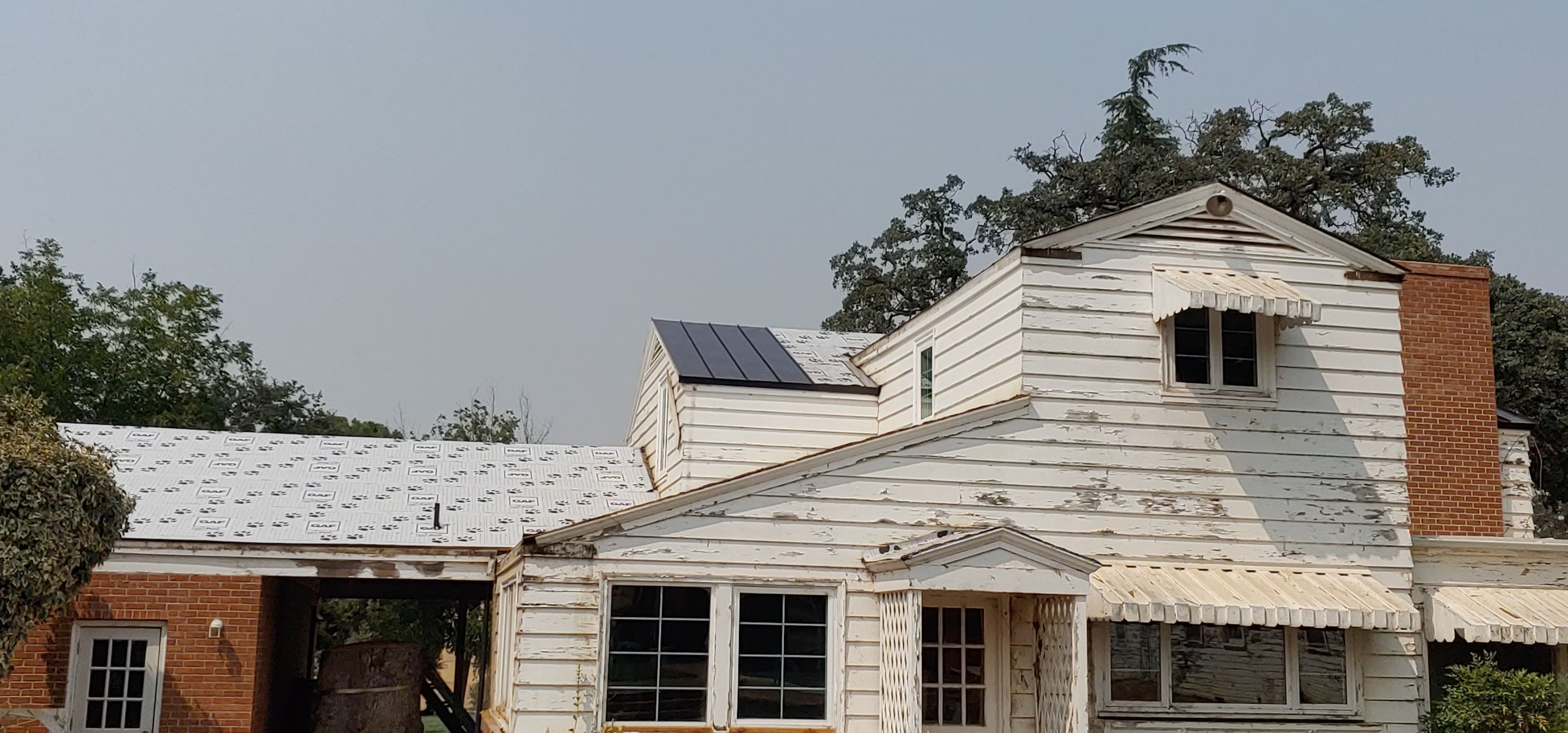 Residential Roofing Installation using Standing seam metal roofing system by Straight Edge Roofing Inc