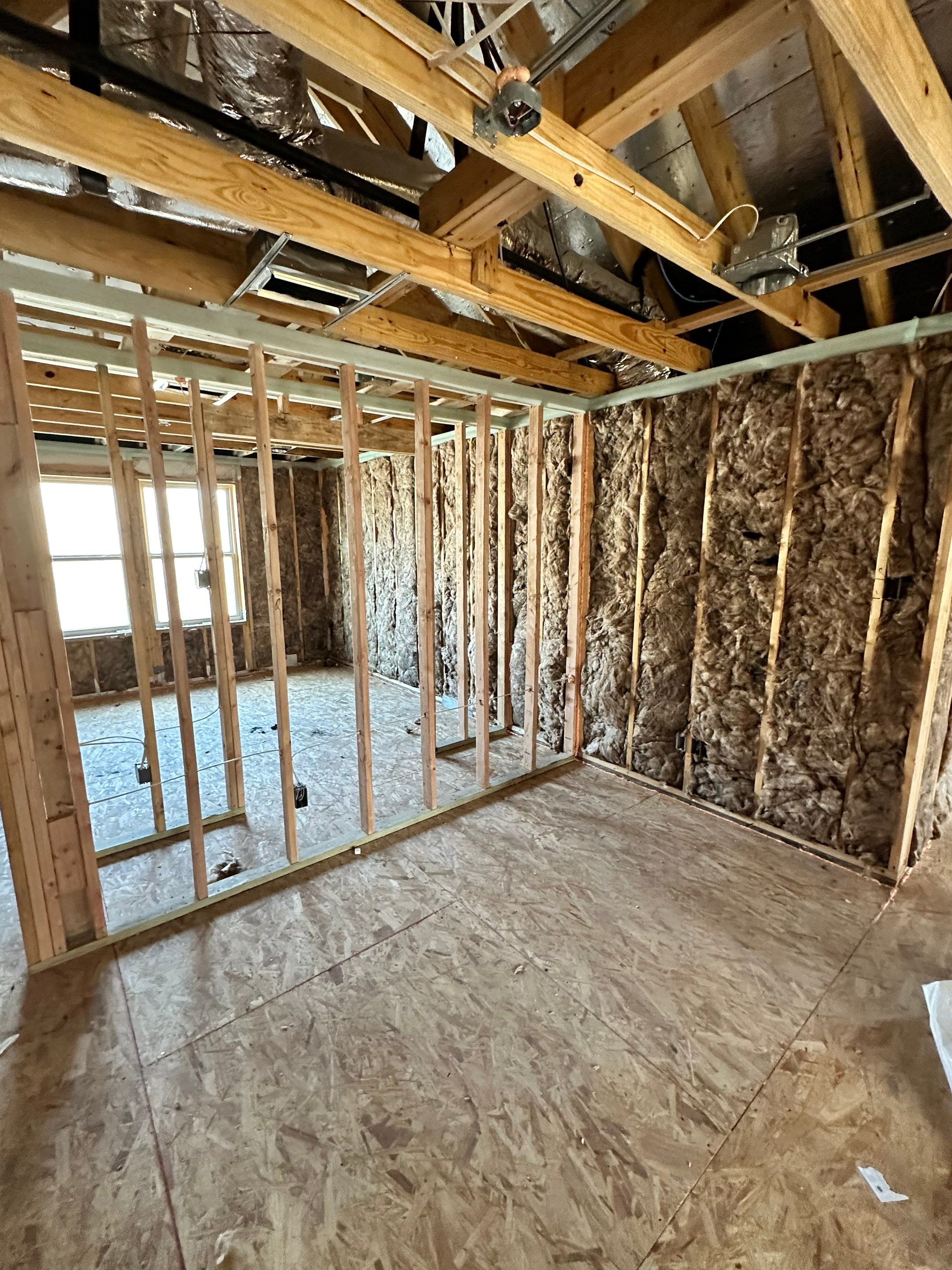 Fiberglass batt install on new construction home in Ft Worth by Apex Insulation Solutions