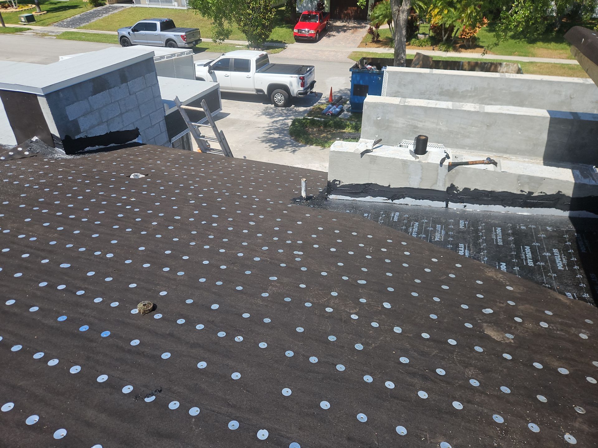 Residential Roofing Installation using 1" Nail strip metal roof by BLUES BROTHERS ROOFING