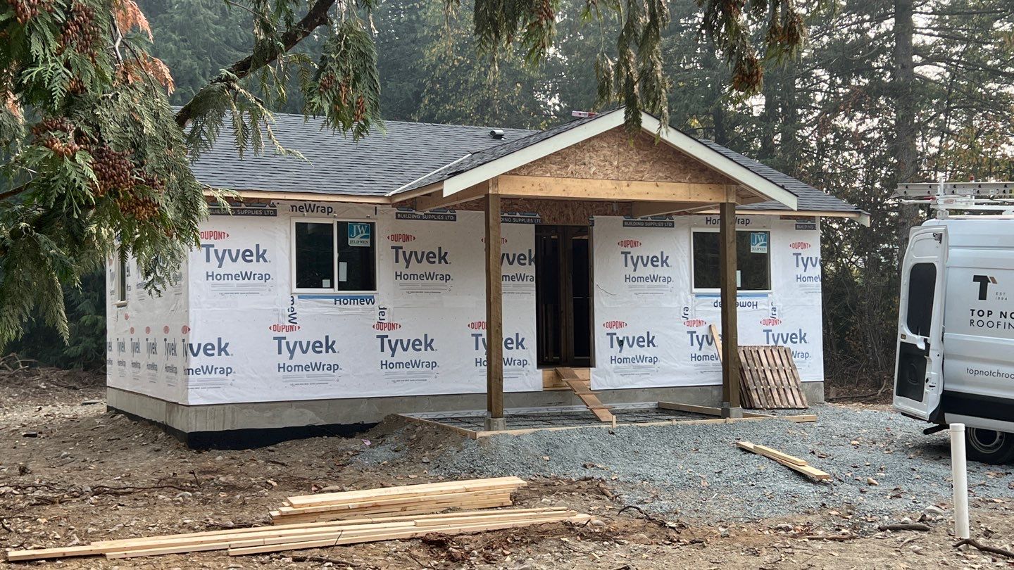 Residential Roofing Installation using OC Oakridge shingles by Top Notch Roofing Inc