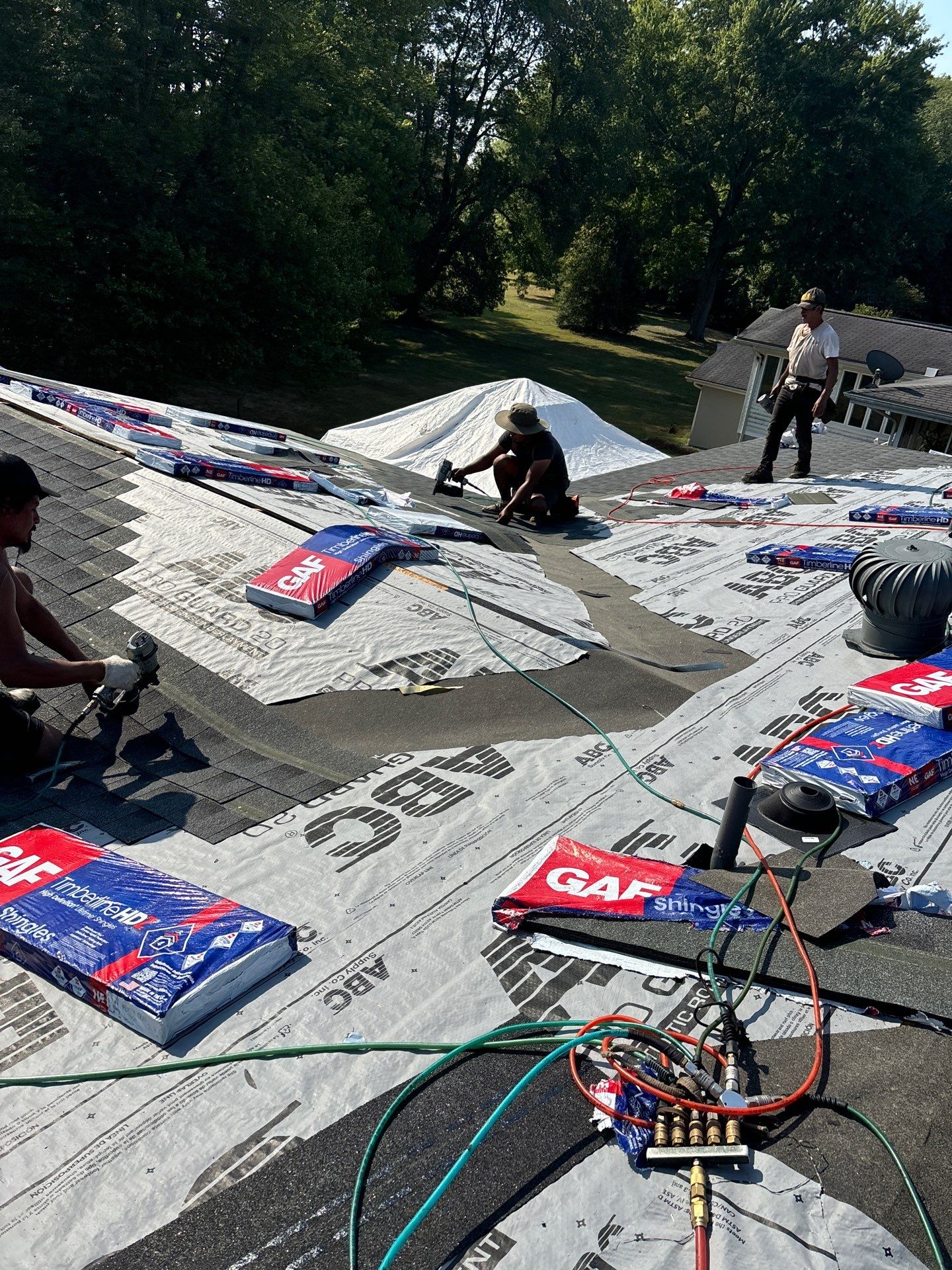 Residential Roofing Installation using GAF Timberline HDZ Charcoal by Rainstoppers Roofing
