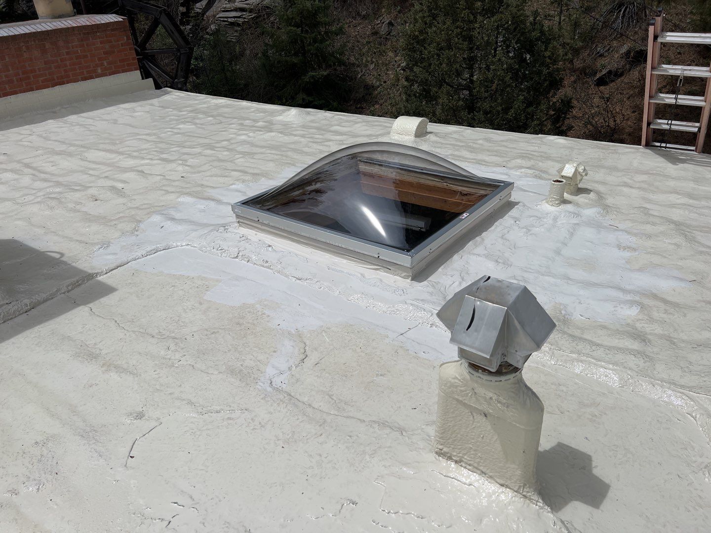 Commercial Roofing Installation using CASTAGRA ECODUR COATING by A to Z Roofing