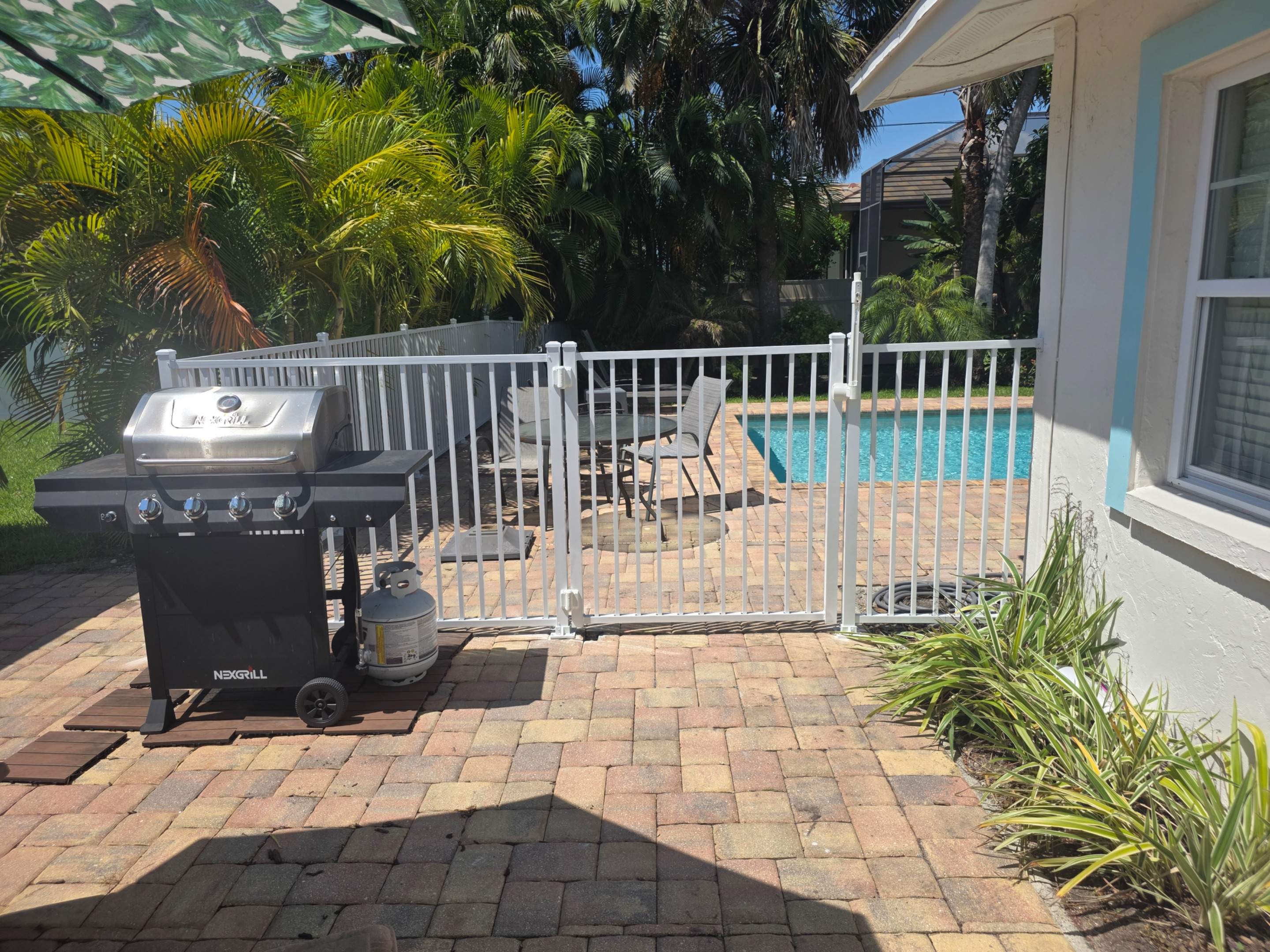 Commercial White Aluminum Pool Fence Installation in Naples by True Fence LLC