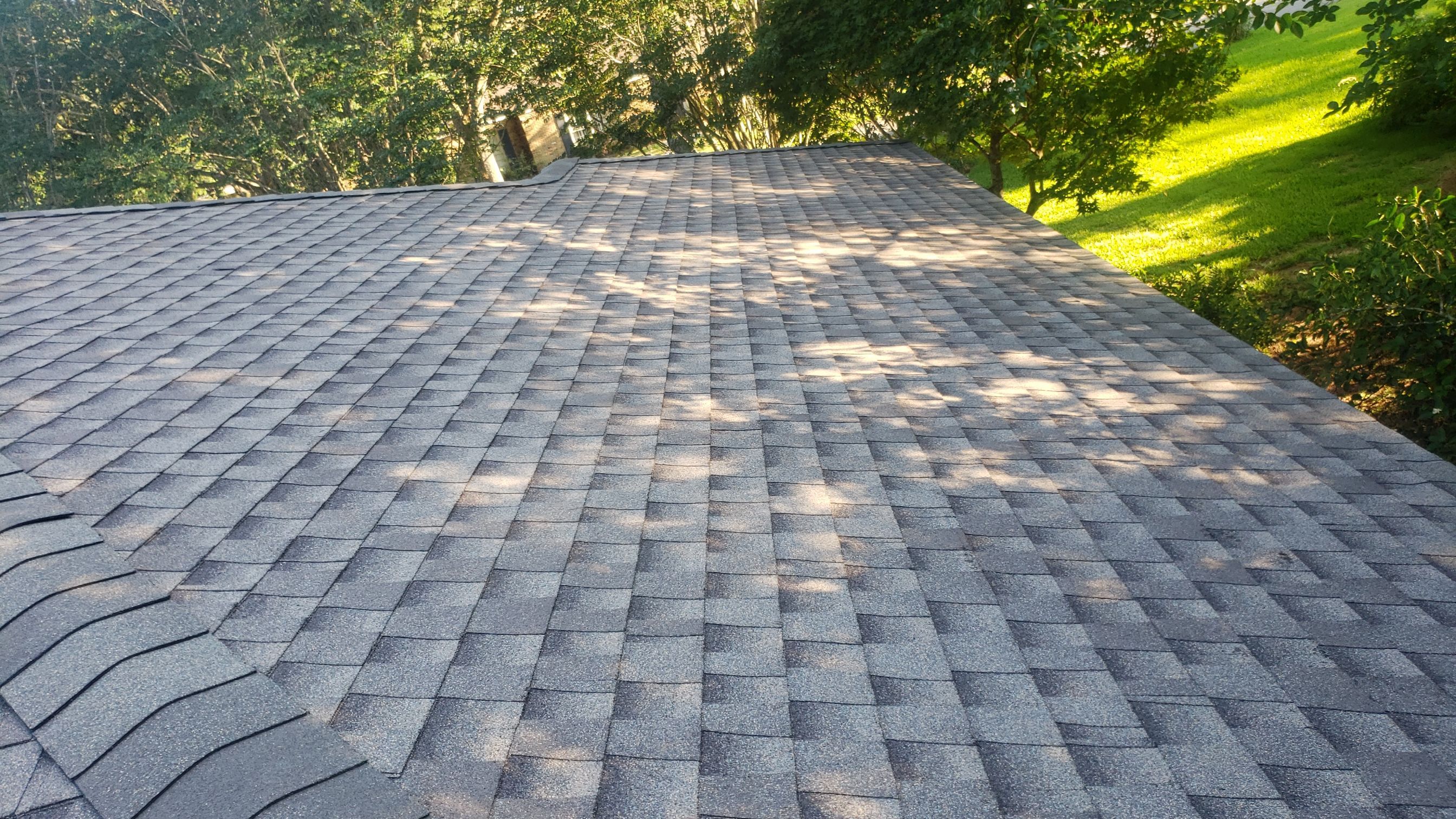 Residential Roofing Installation using Roof Replacement by American Roofing & Construction LLC