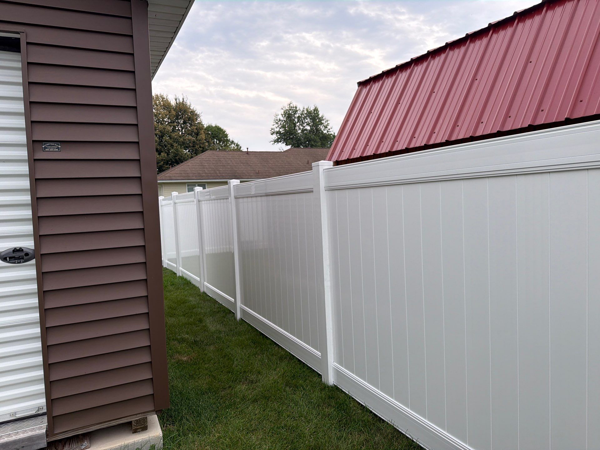 White Vinyl Privacy Fence and Double Gate Installation in Jesup by Perfect Picket Fence and Stain