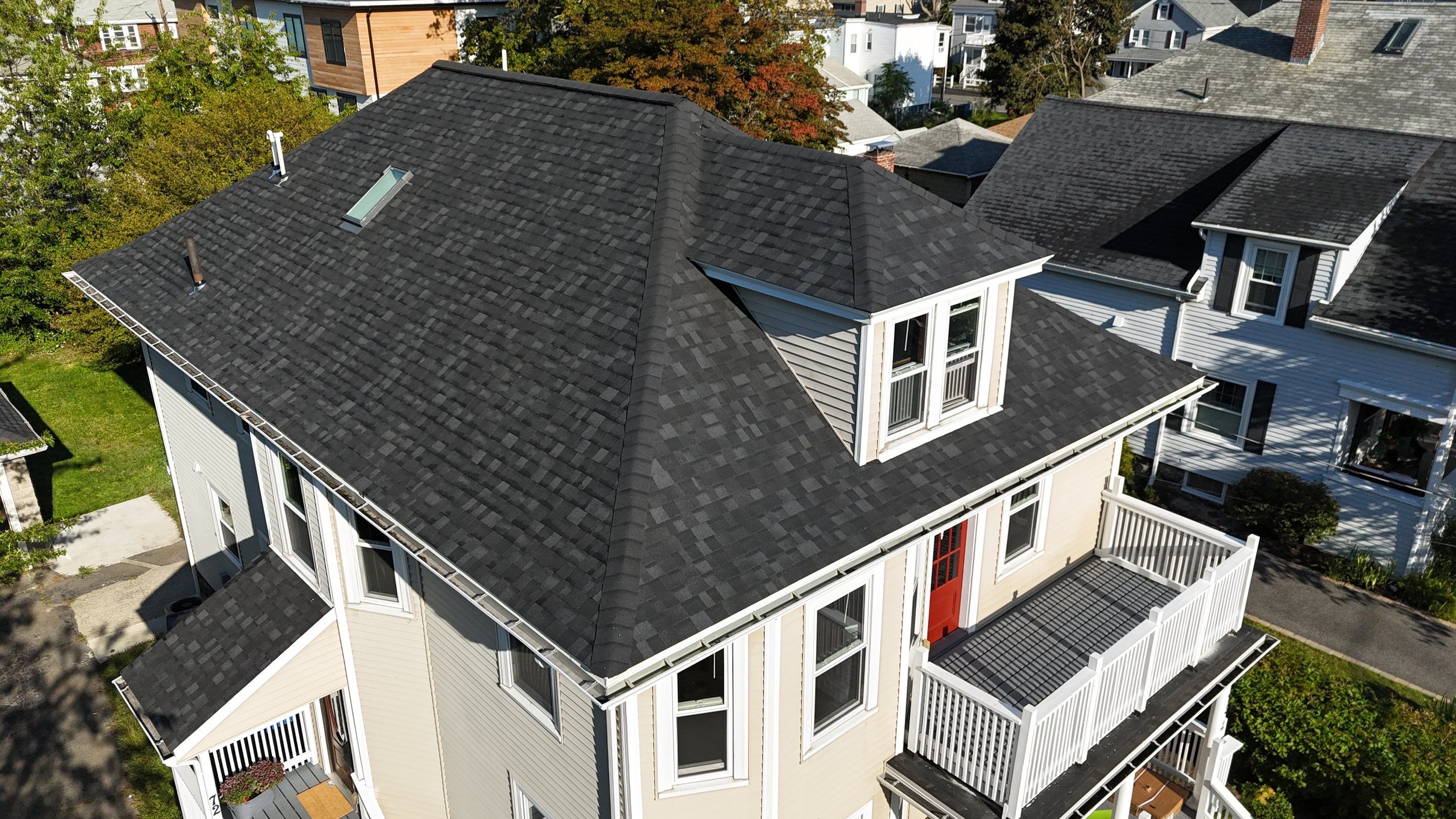 Roof Replacement with Skylight Flashing in Waltham, MA by Mighty Dog Roofing of Greater Middlesex County