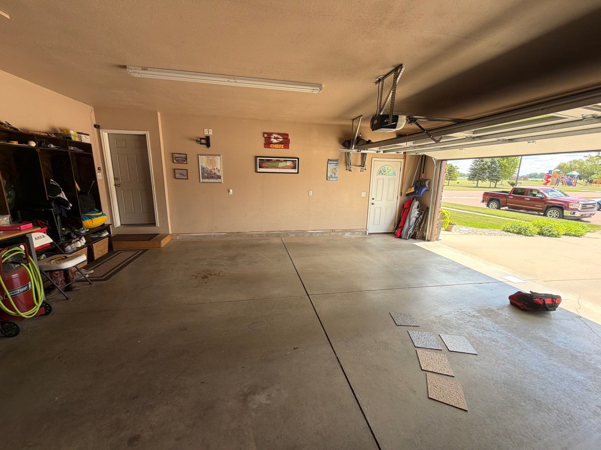 Multi-Car Garage Floor Coating and Crack Repair in Tea by Select Painting, Coatings & Garage Cabinets