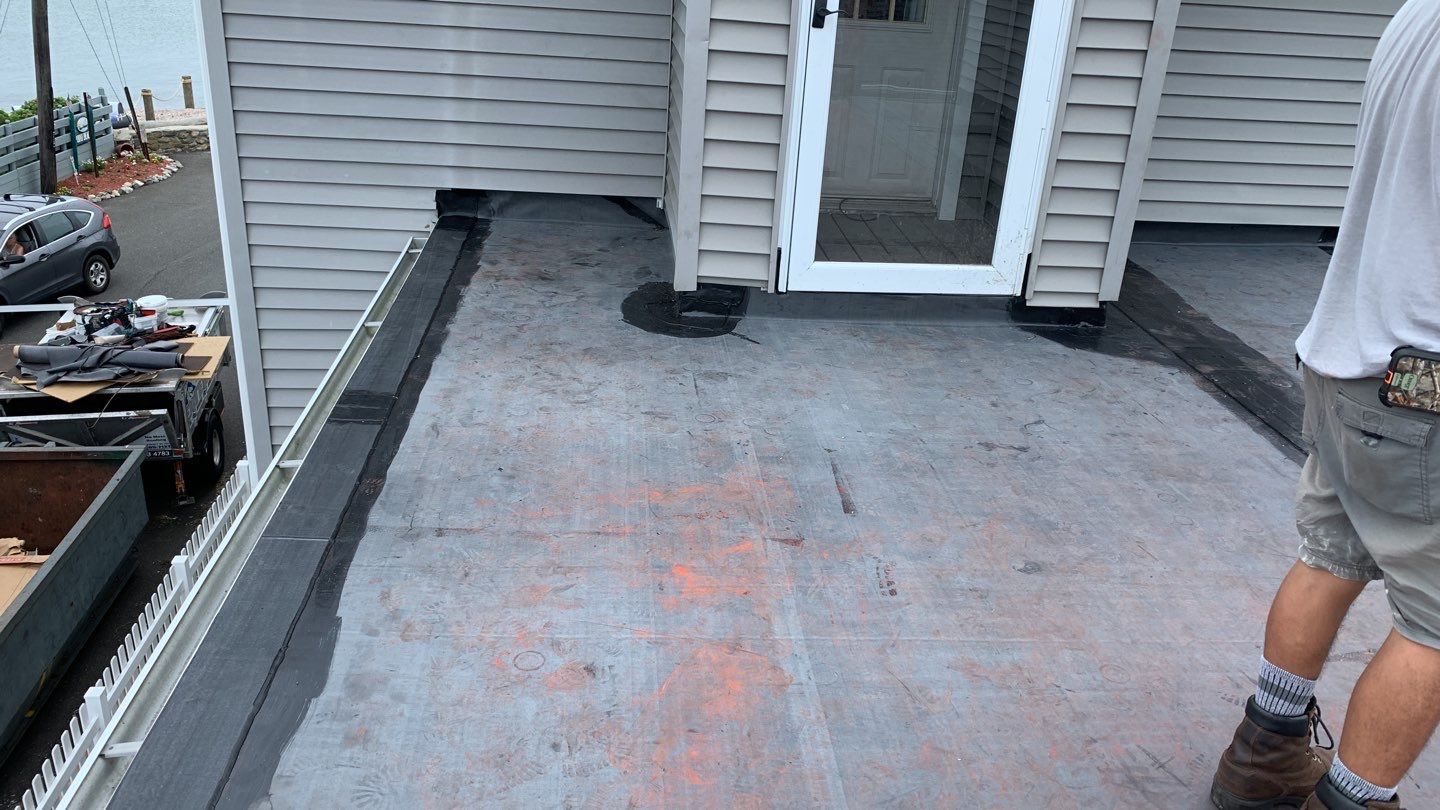 Deck Installation using trex over epdm roof by A Plus Exterior