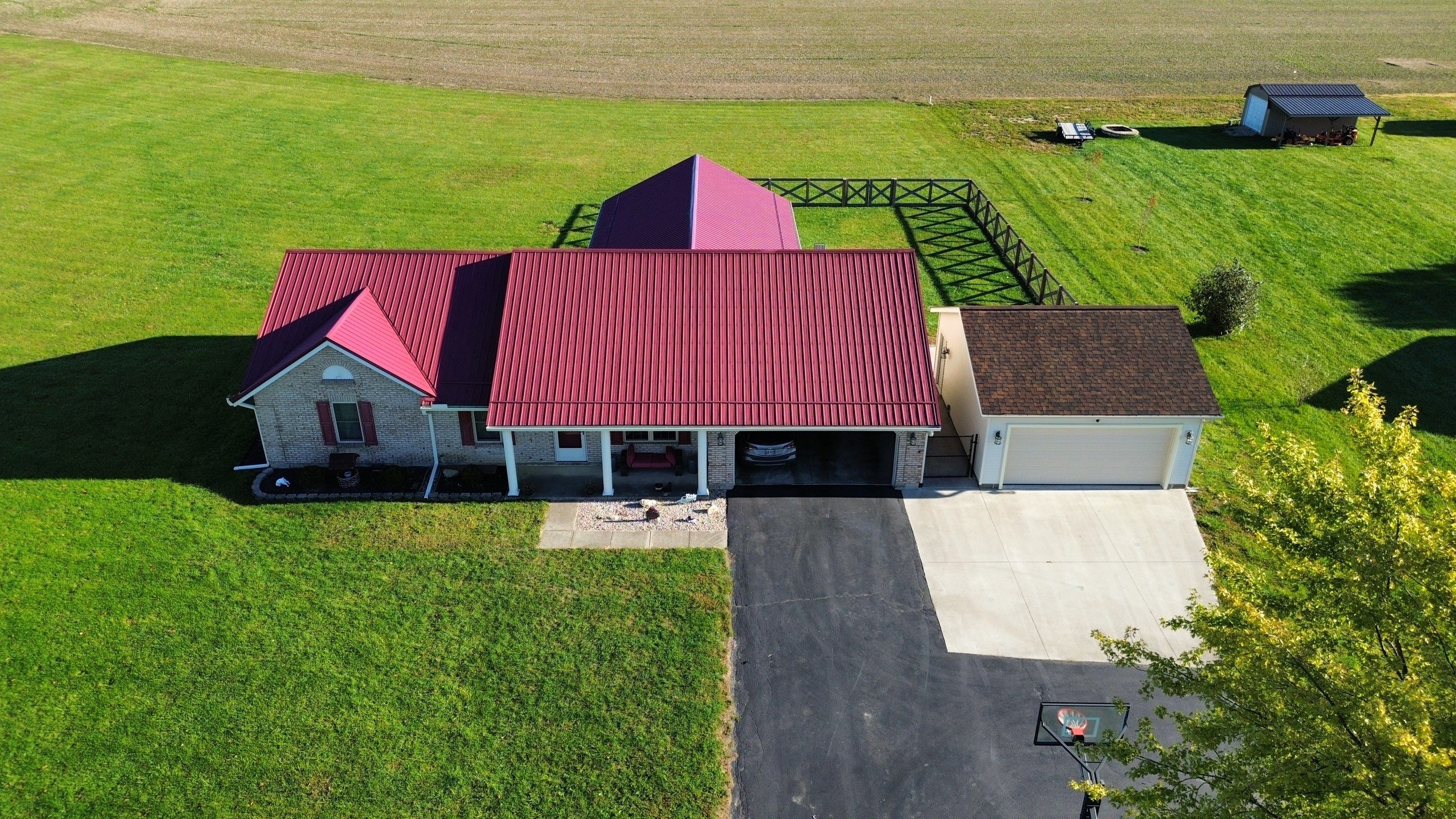 Residential Roofing Installation using Performance Panel Metal - Burgandy by RoofX 