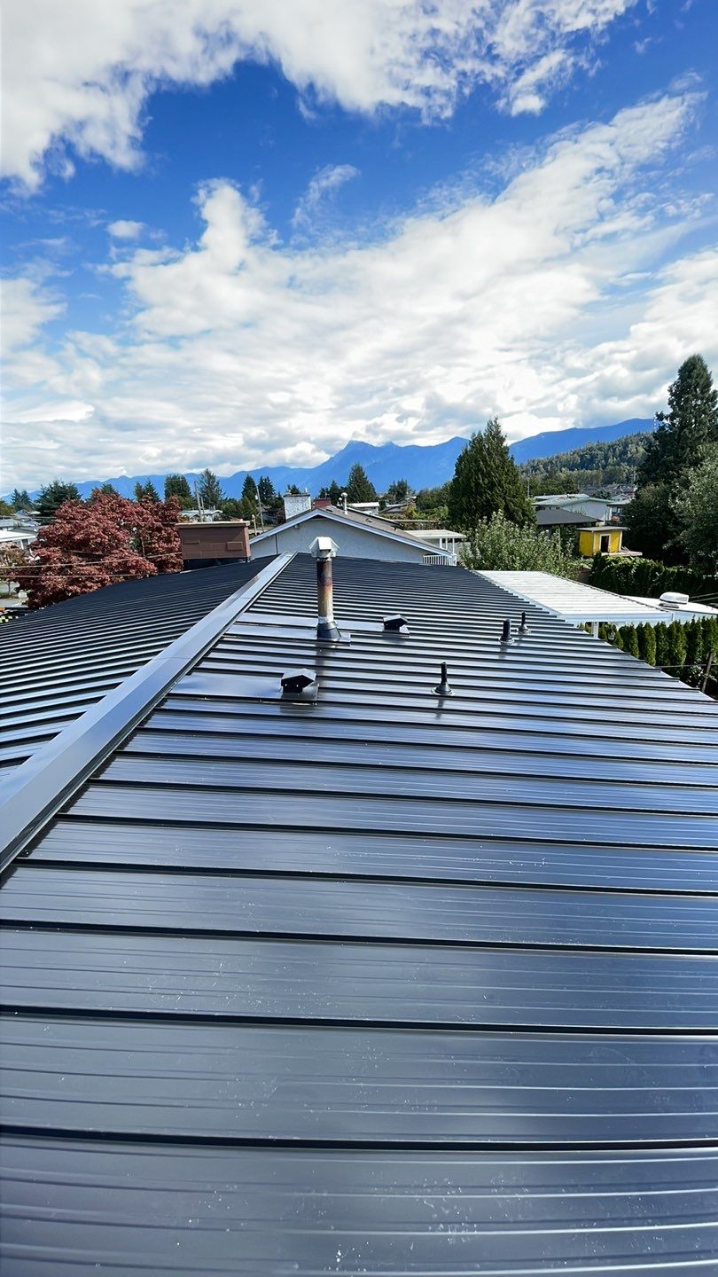 Residential Roofing Installation using 12" Prolok metal  by Top Notch Roofing Inc