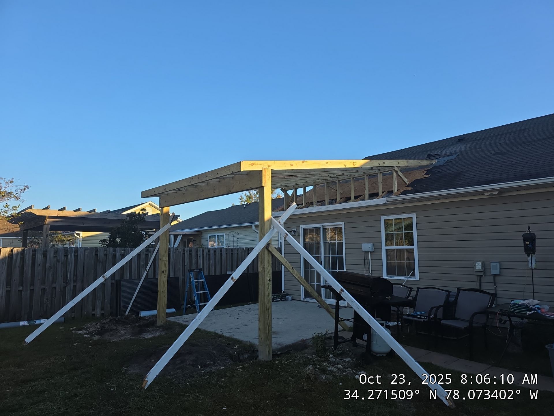 Covered Porch Build and Fortified Roof Replacement with Solar Panels by RGR Construction and Roofing, LLC