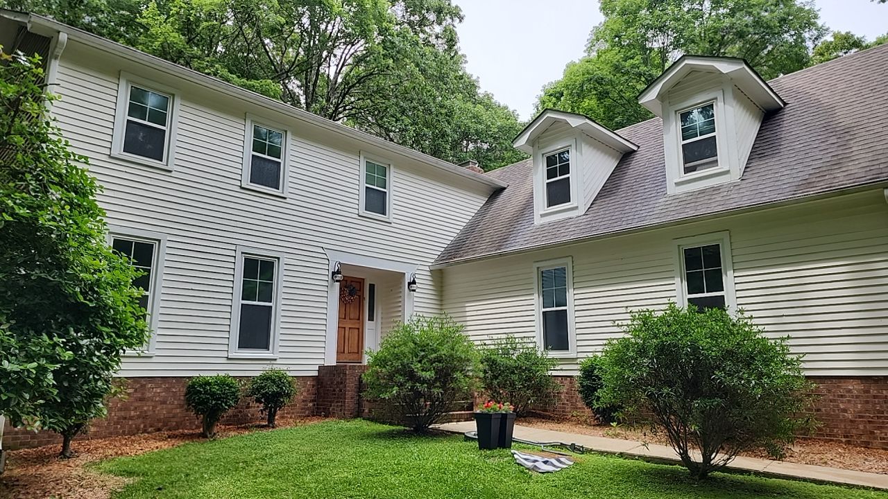 House Wash using cleaner by Power Wash Masters LLC