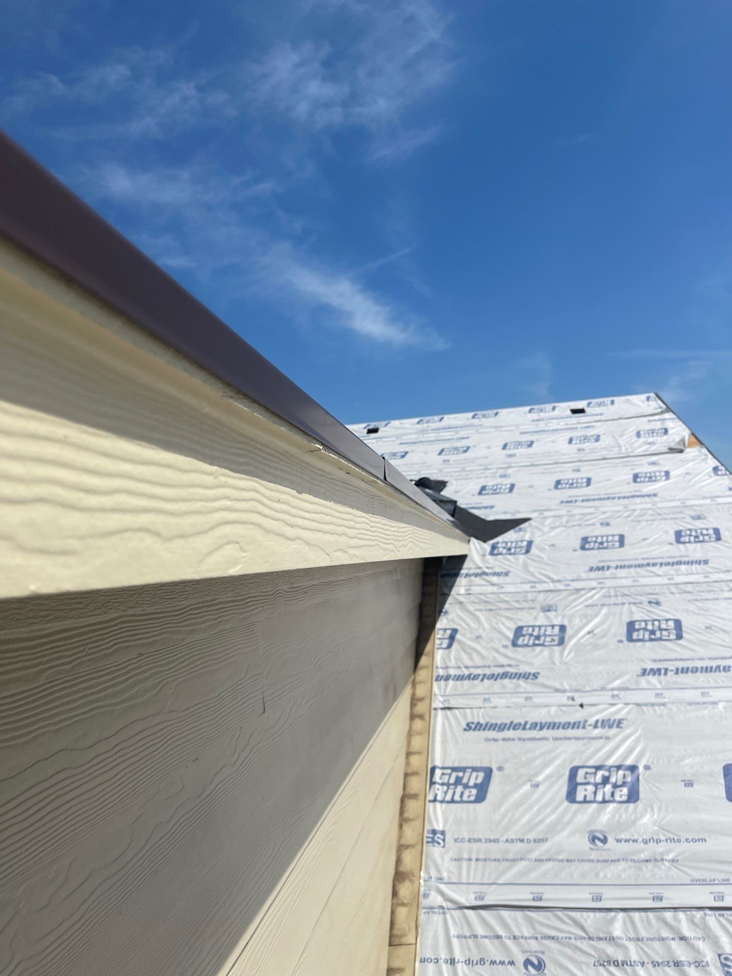 Residential Roofing Installation using Owens Corning Oakridge Brownwood by DeZign Roofing & Exteriors