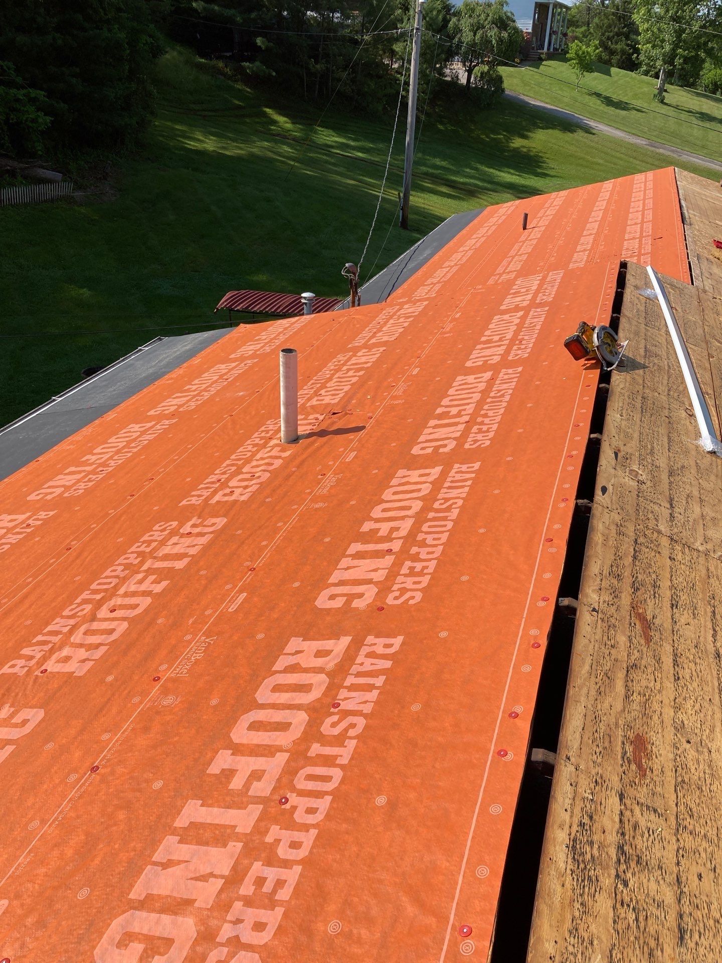 Residential Roofing Installation using GAF Timberline HDZ Charcoal by Rainstoppers Roofing