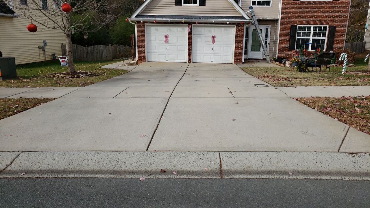 gutters and Driveway by Power Wash Masters LLC