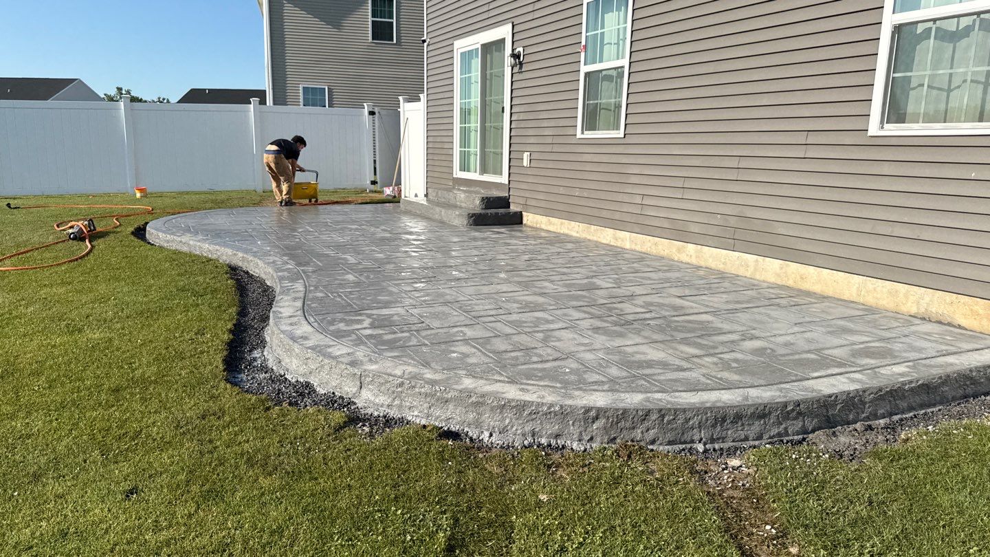 Stamped English Rivenstone Concrete Patio  by NG Masonry & Construction LLC
