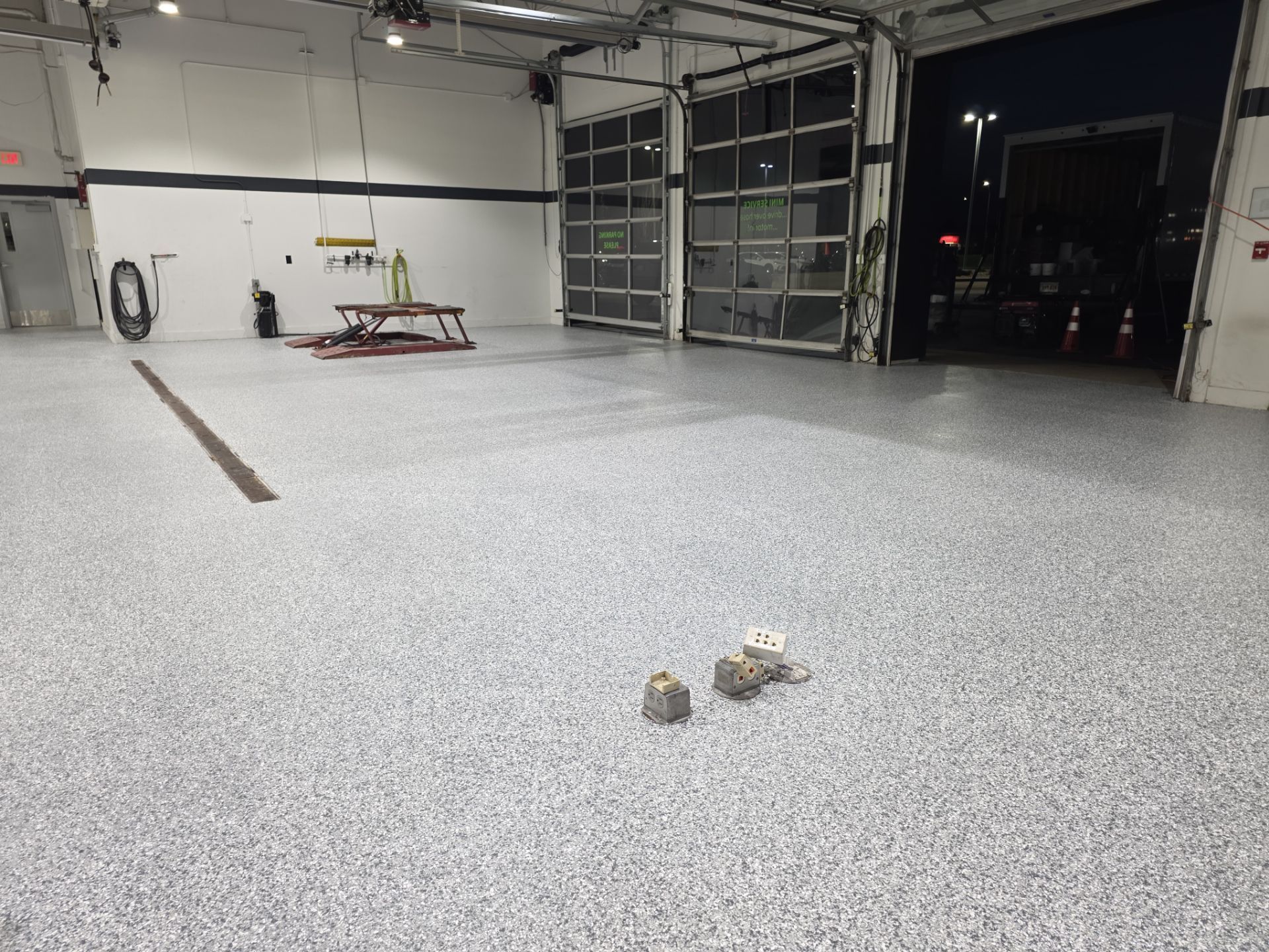 Mini Cooper Commercial Epoxy Floor Installation by Revival Concrete Coatings