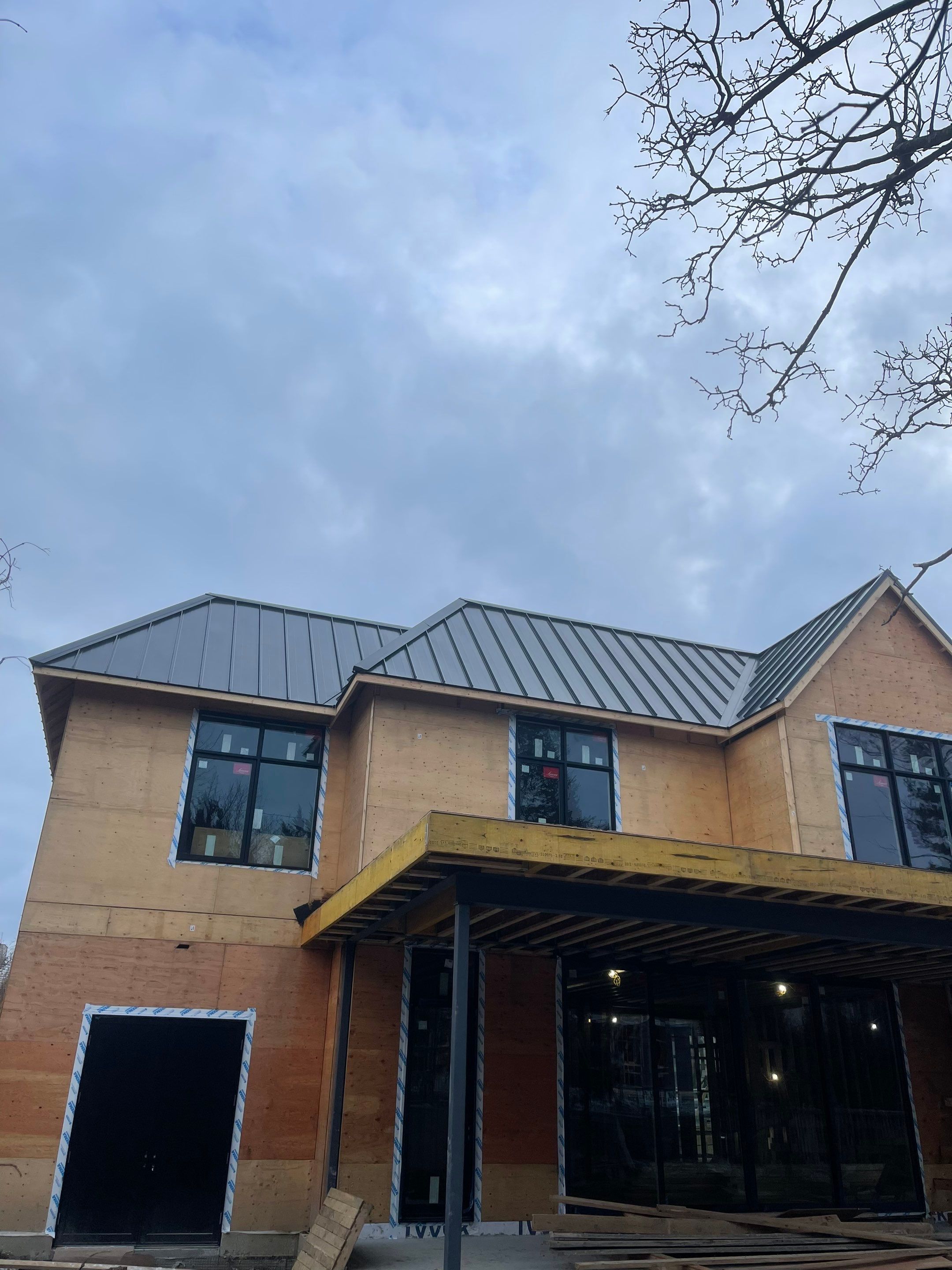 New Home Construction using 16" Standing Seam Panels by Jay Carter Roofing & Sheet Metal