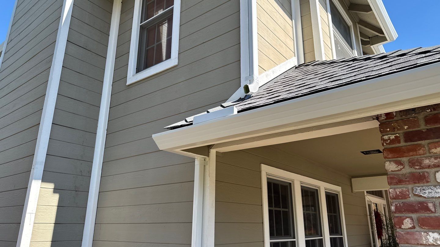 New shingles and gutters using GAF Timberline HDZ shingles and aluminum gutter by Straight Edge Roofing Inc